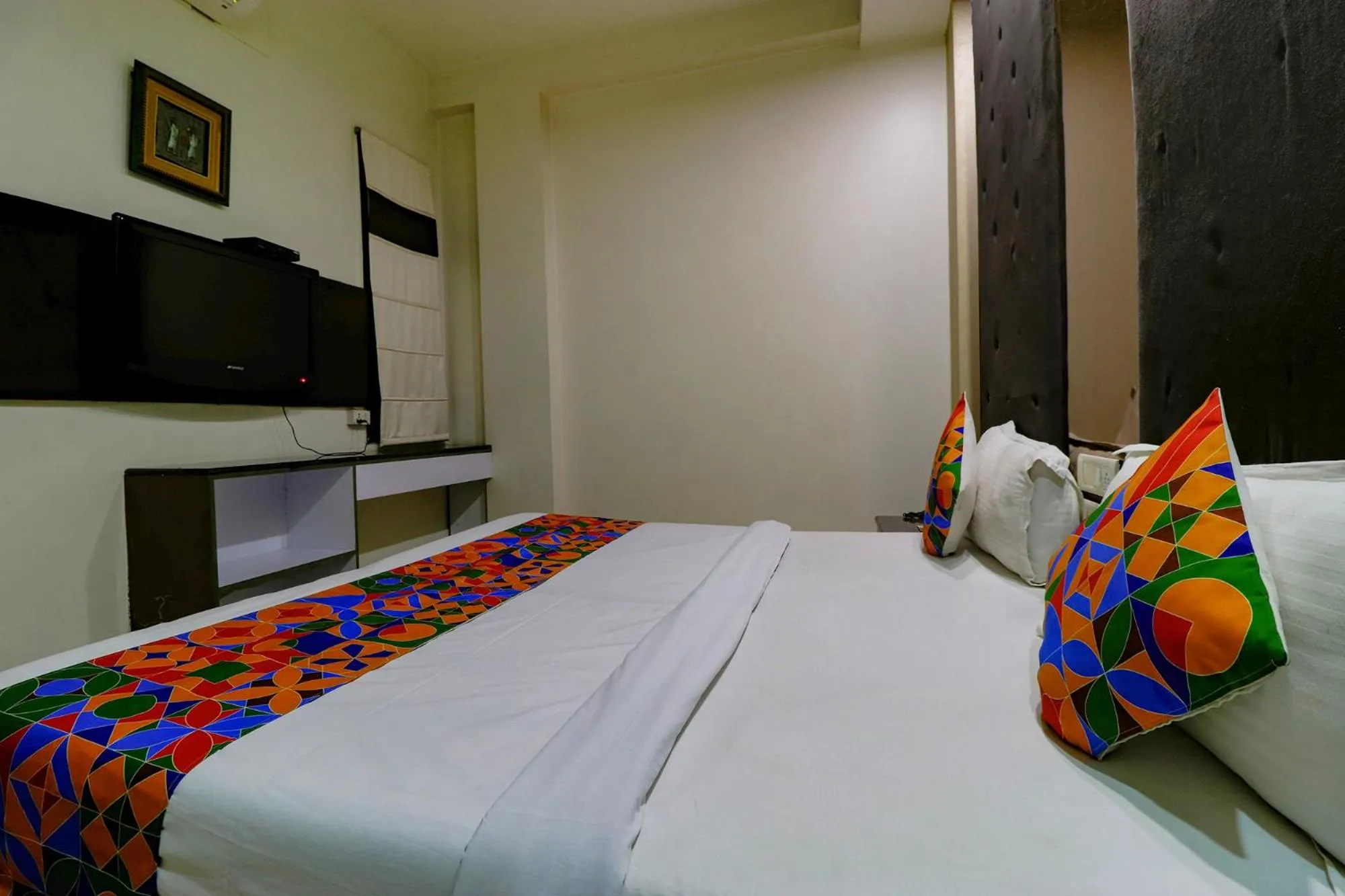 Bed in FabHotel Yug Villa