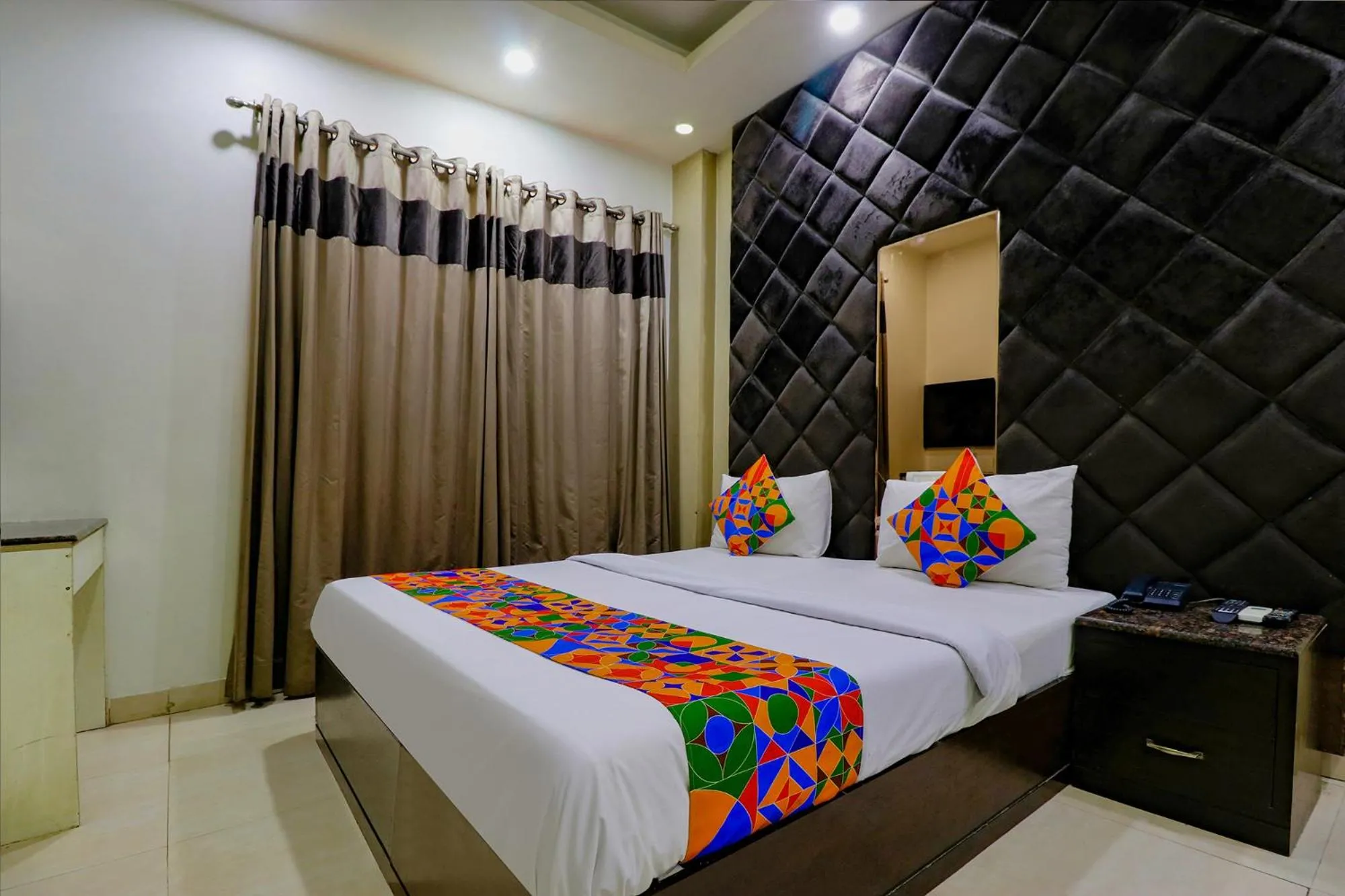 Bed in FabHotel Yug Villa