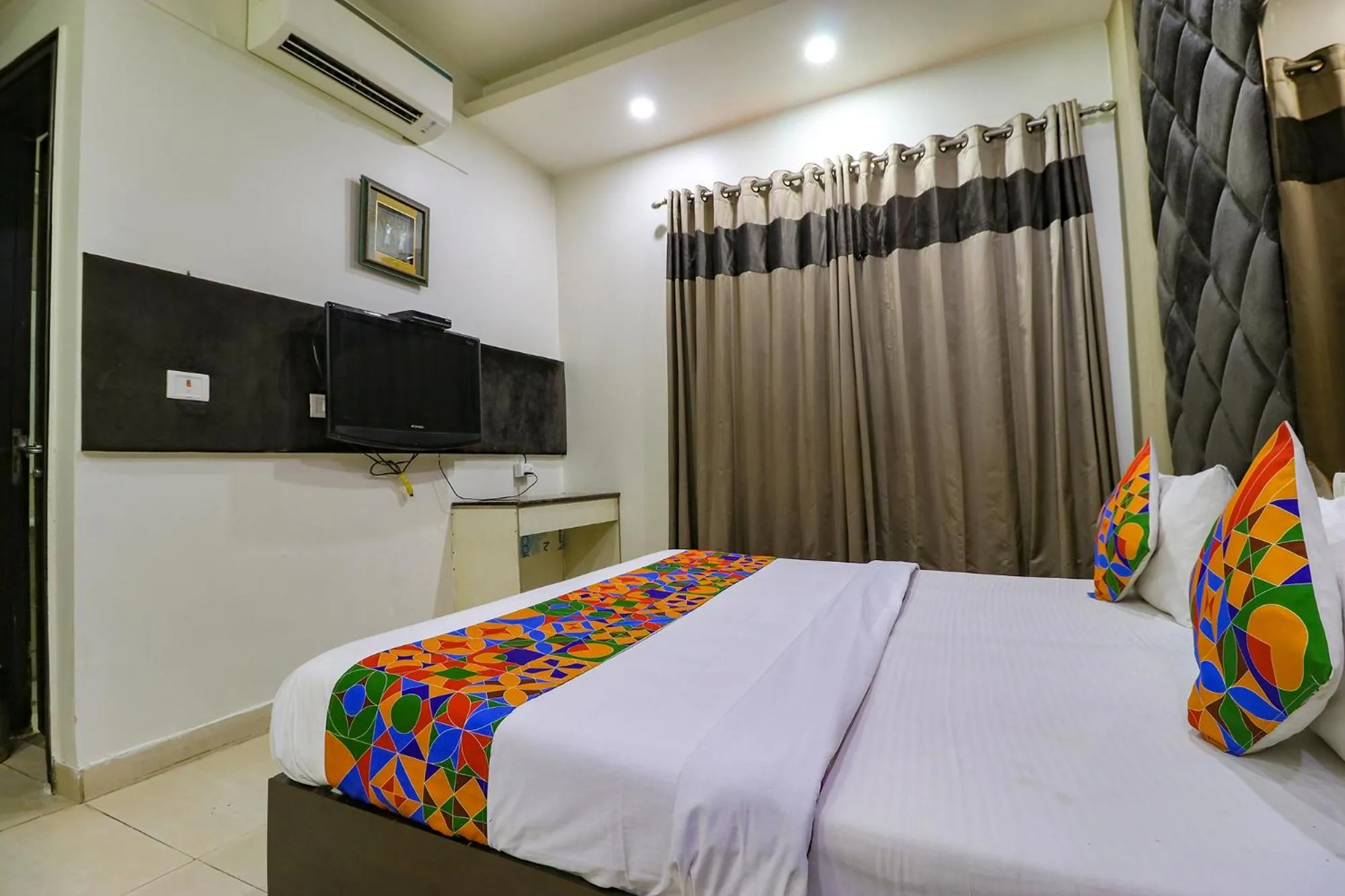 Bed in FabHotel Yug Villa