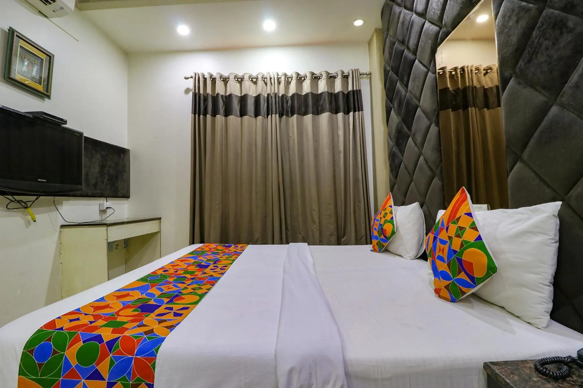 Bed in FabHotel Yug Villa