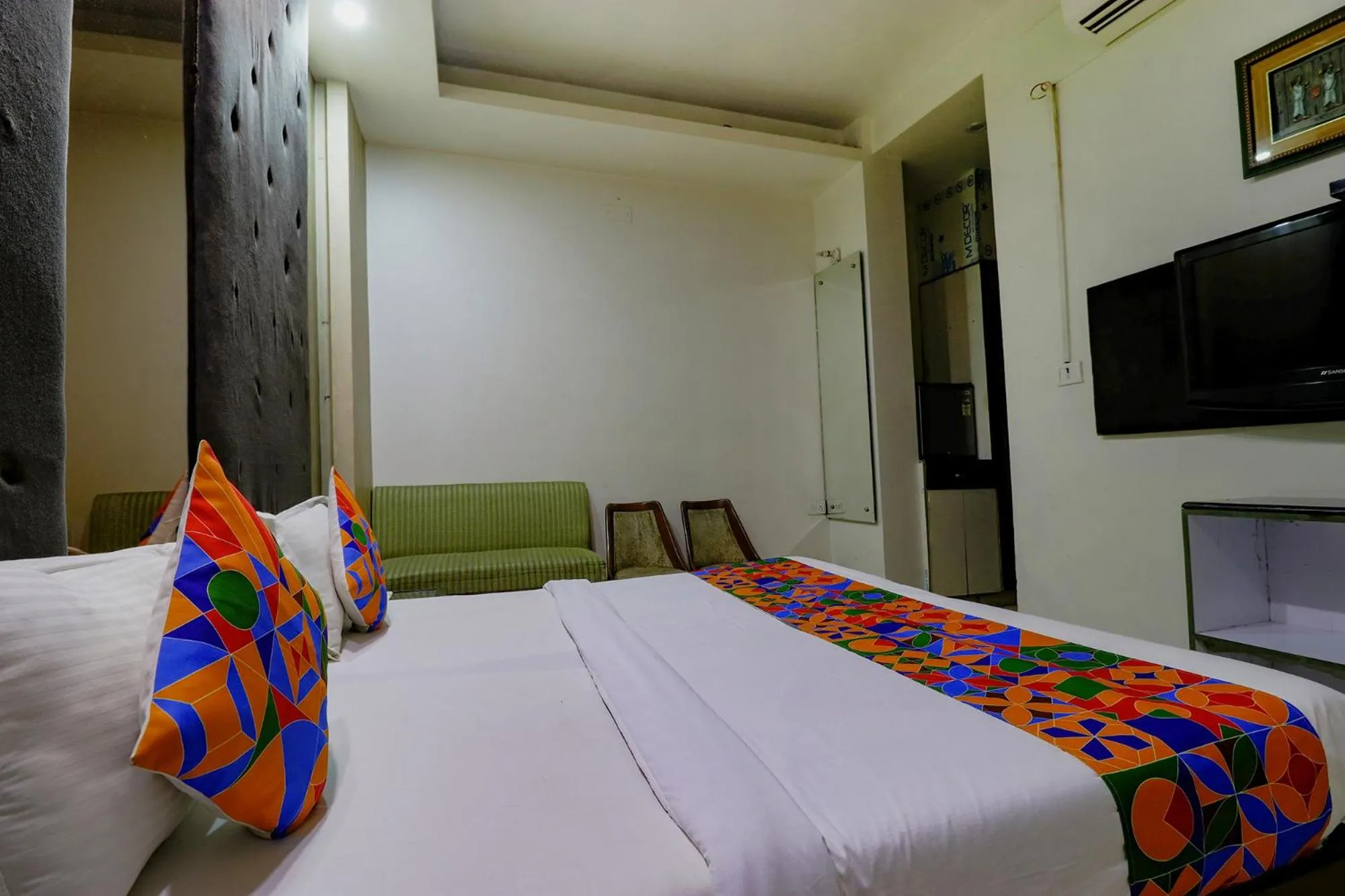 Bed in FabHotel Yug Villa
