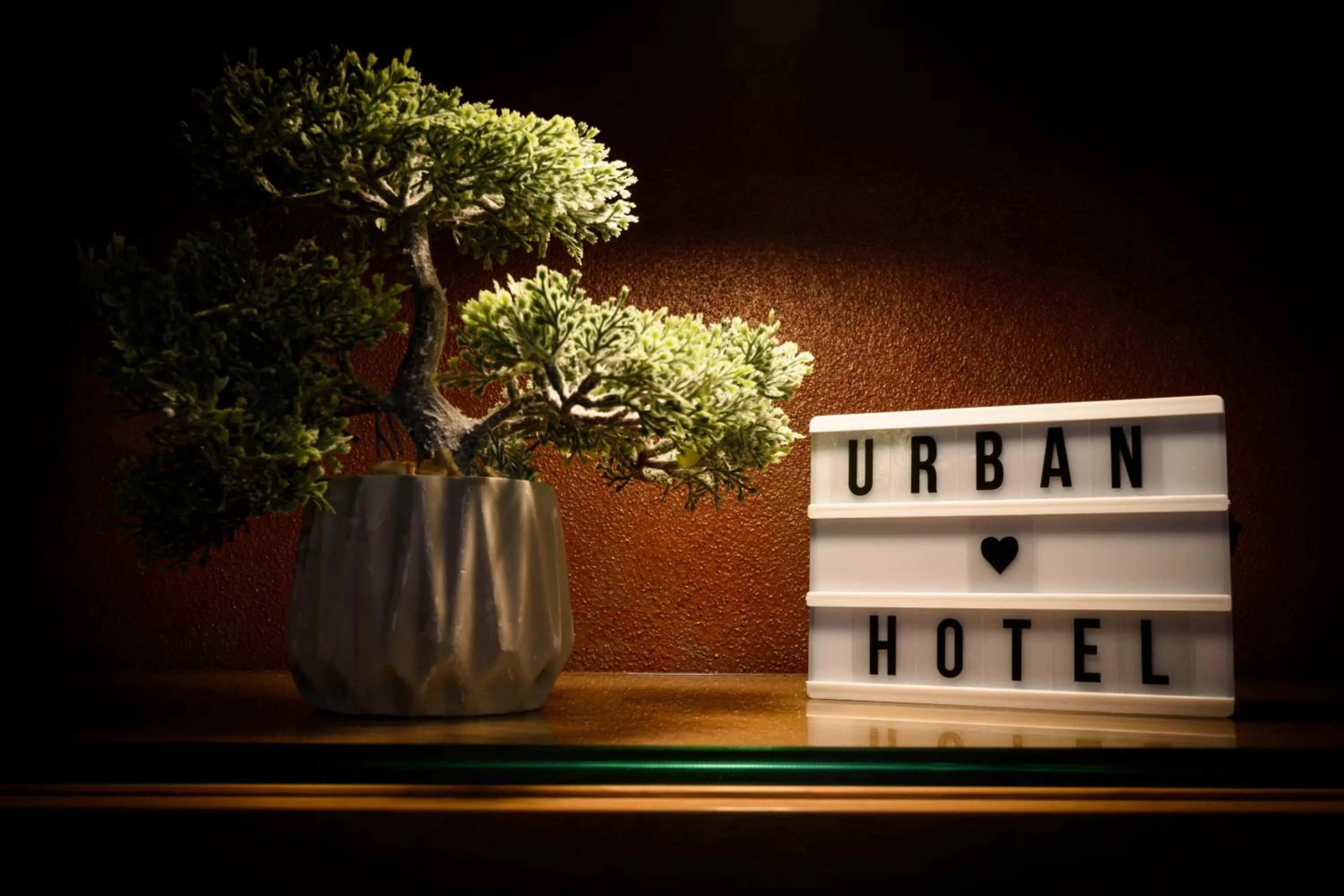 Property logo or sign in Hotel Urban