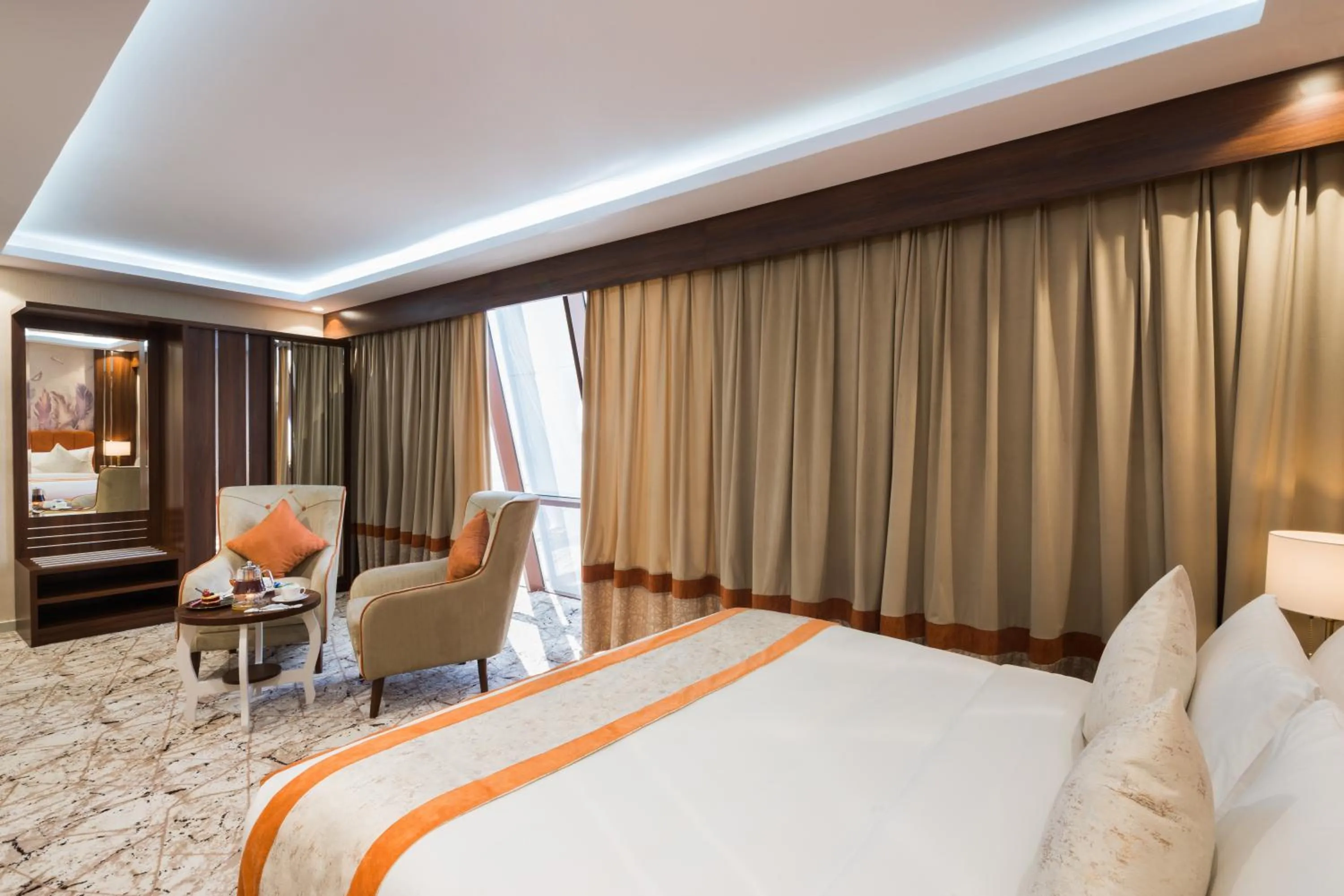 Bed in Tulip Plaza Hotel
