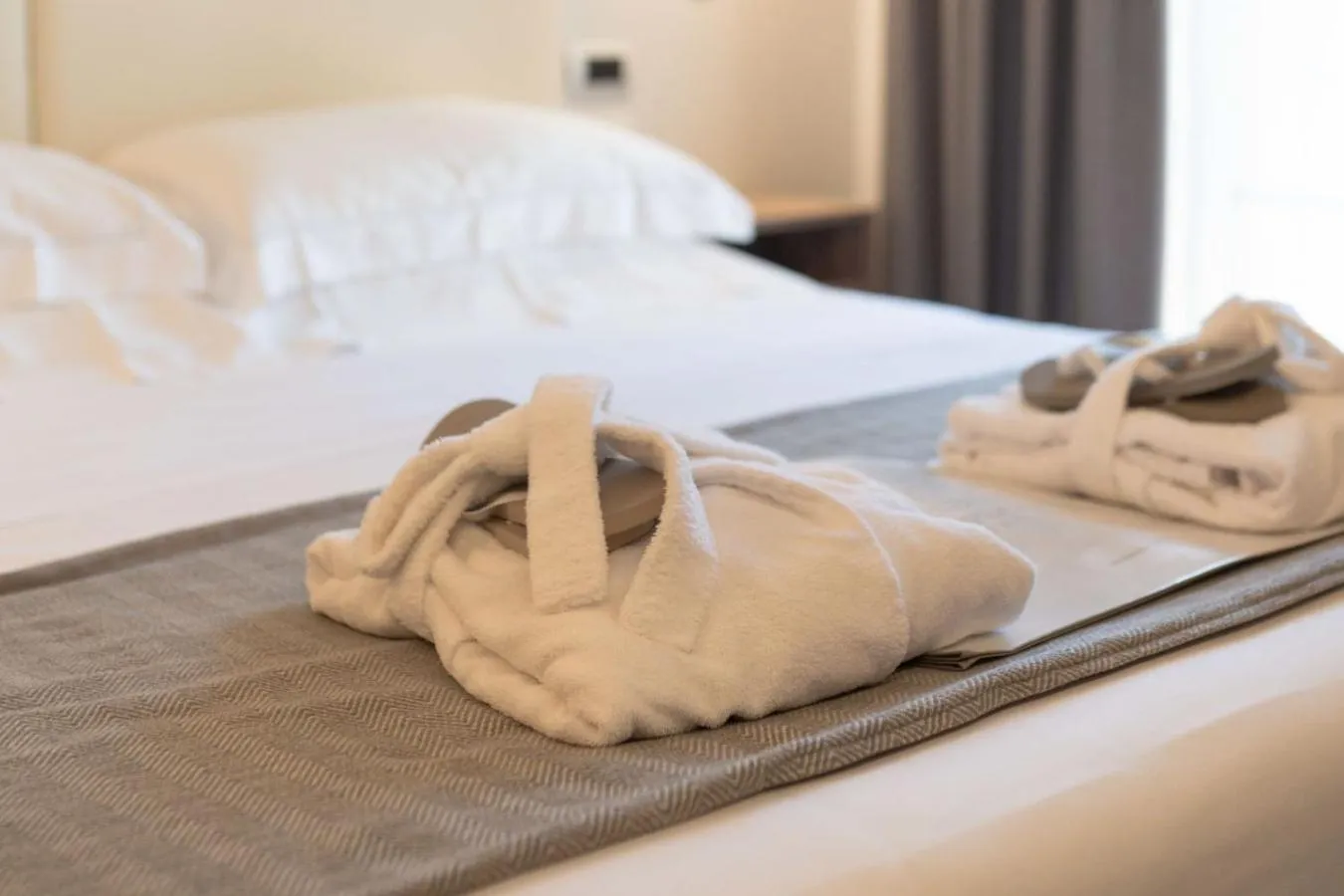 Bathroom, Bed in Le Cappuccinelle Suites&SPA