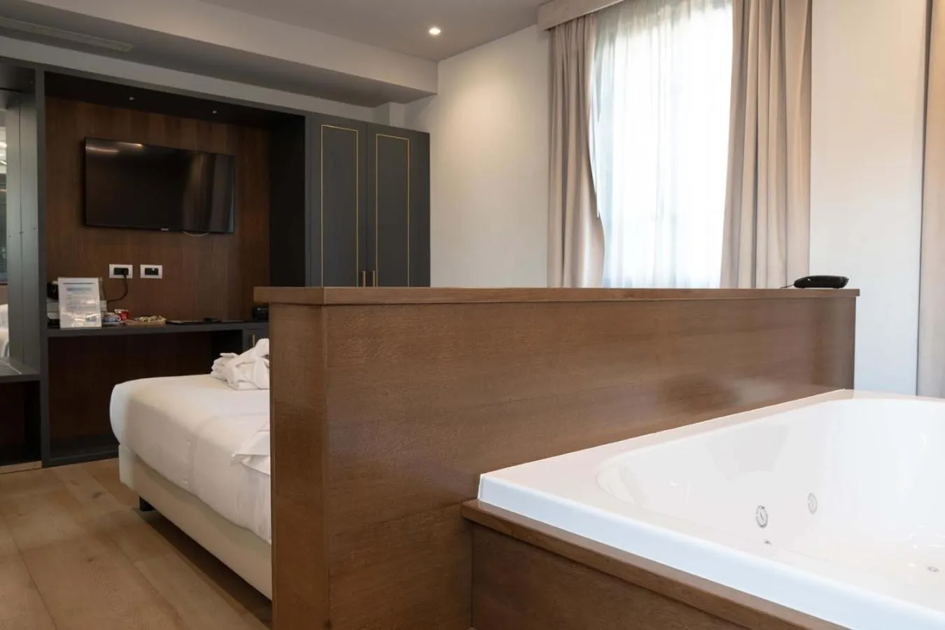 Bed in Le Cappuccinelle Suites&SPA