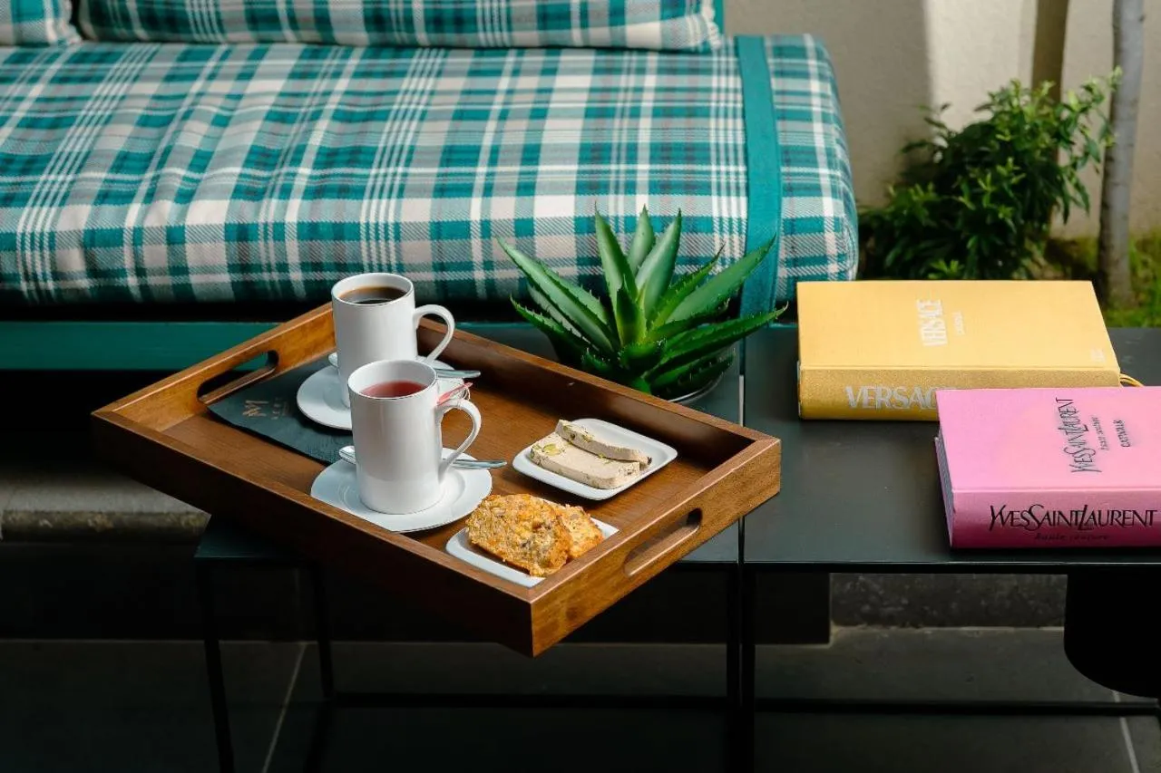 Seating area, Bed in Mert Boutique Hotel