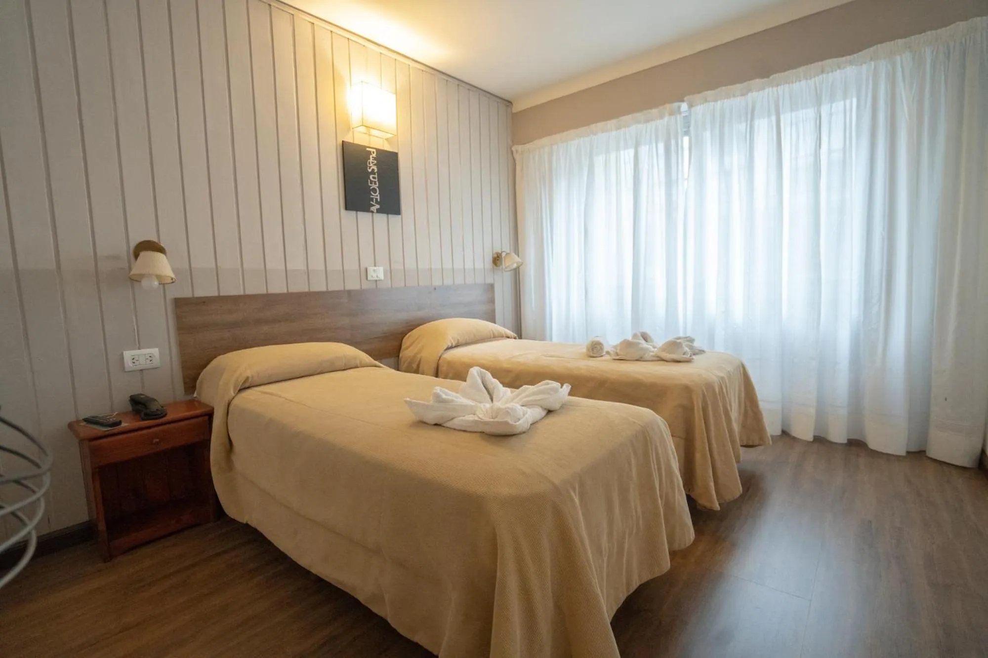 Bed in Tangoinn Club Hotel