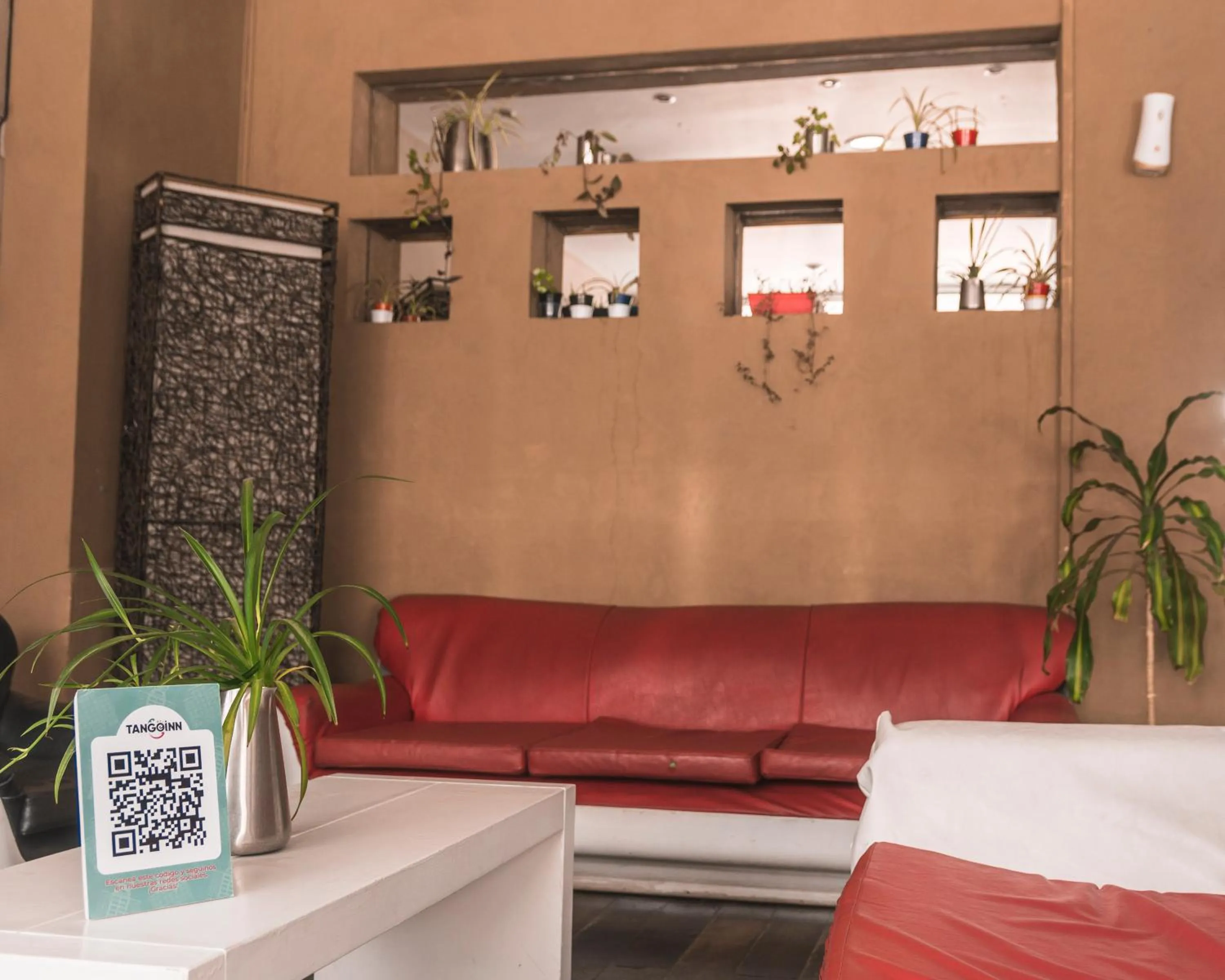 Living room in Tangoinn Club Hotel