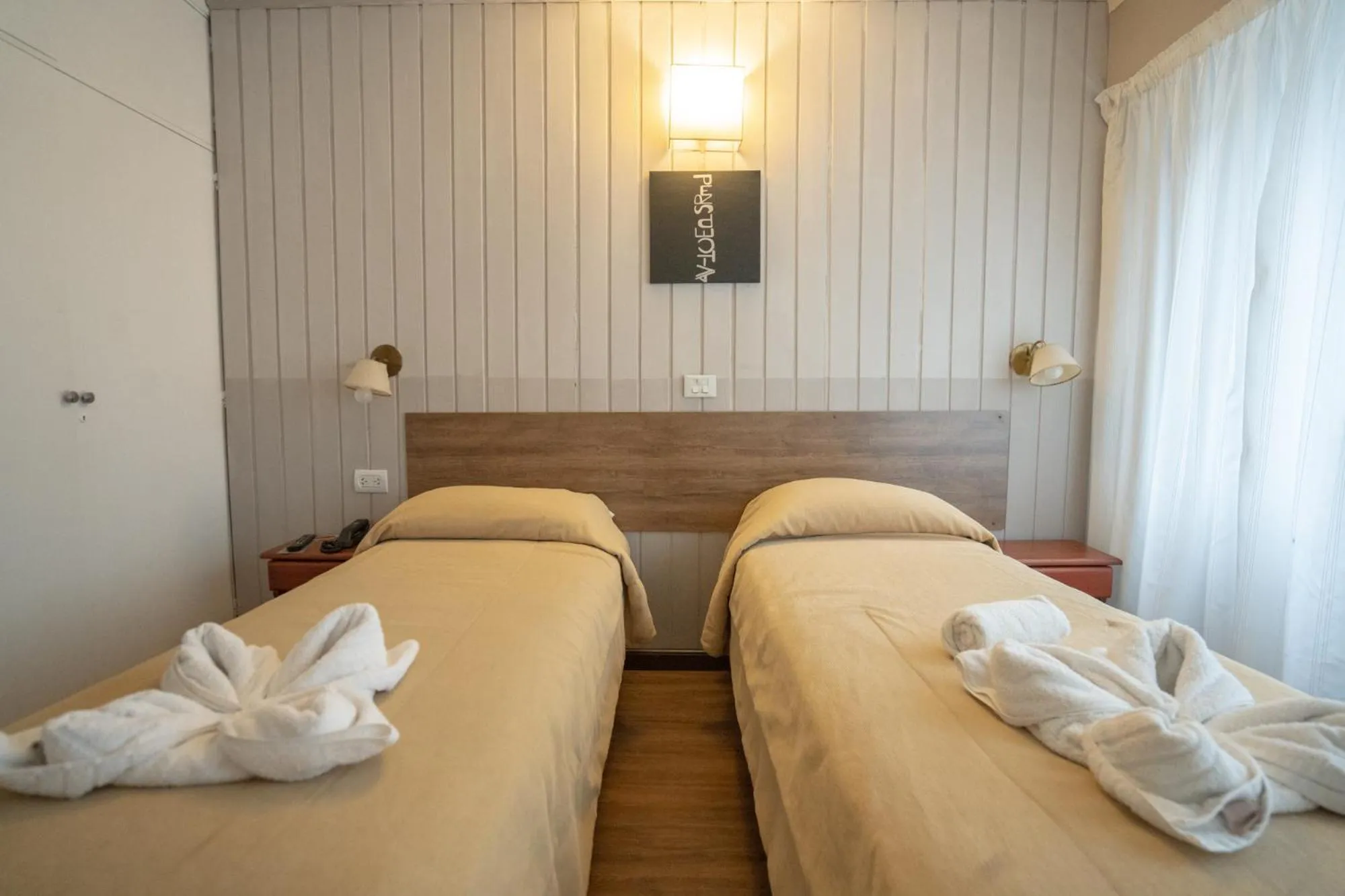 Bed in Tangoinn Club Hotel