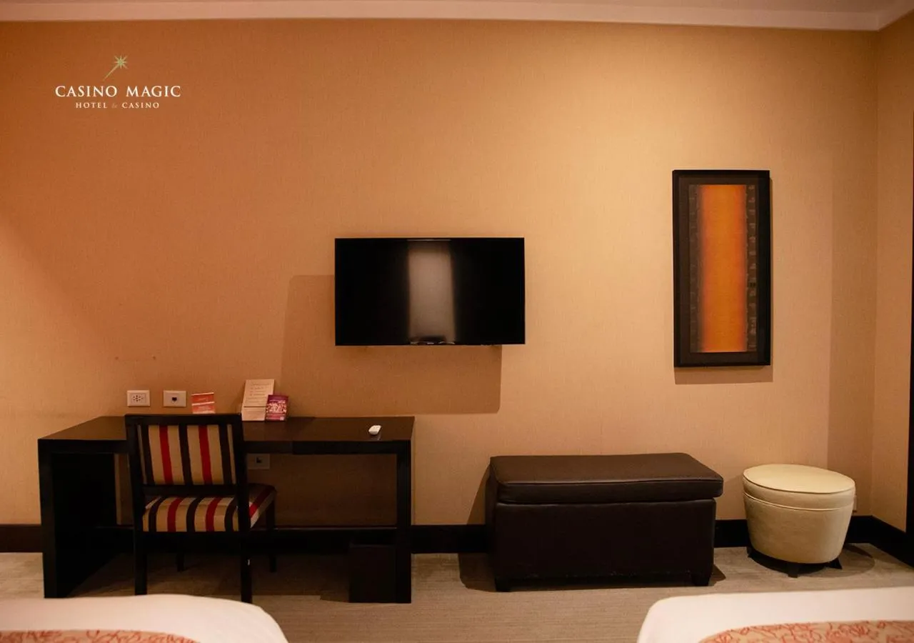 Bed in Hotel Casino Magic