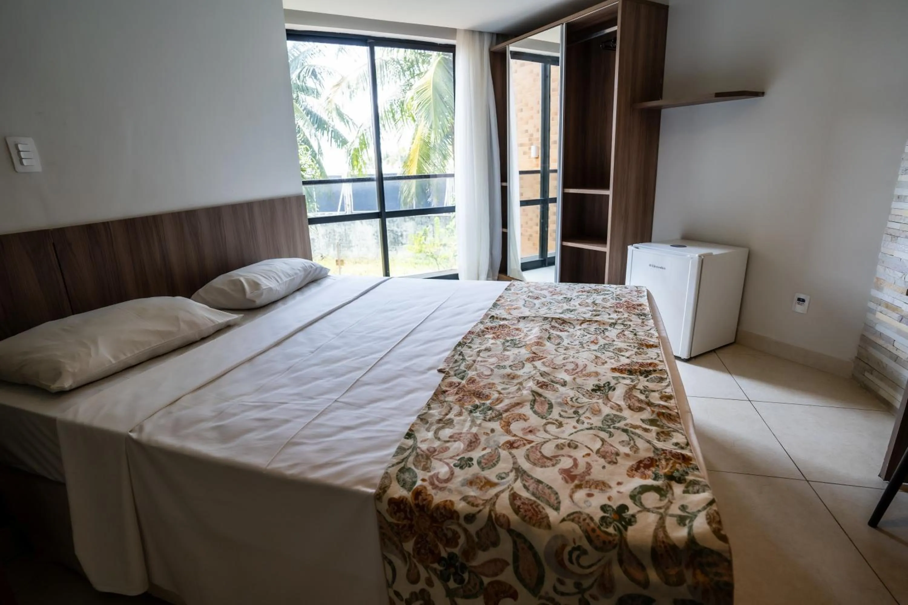 Bed in Bessa Beach Hotel