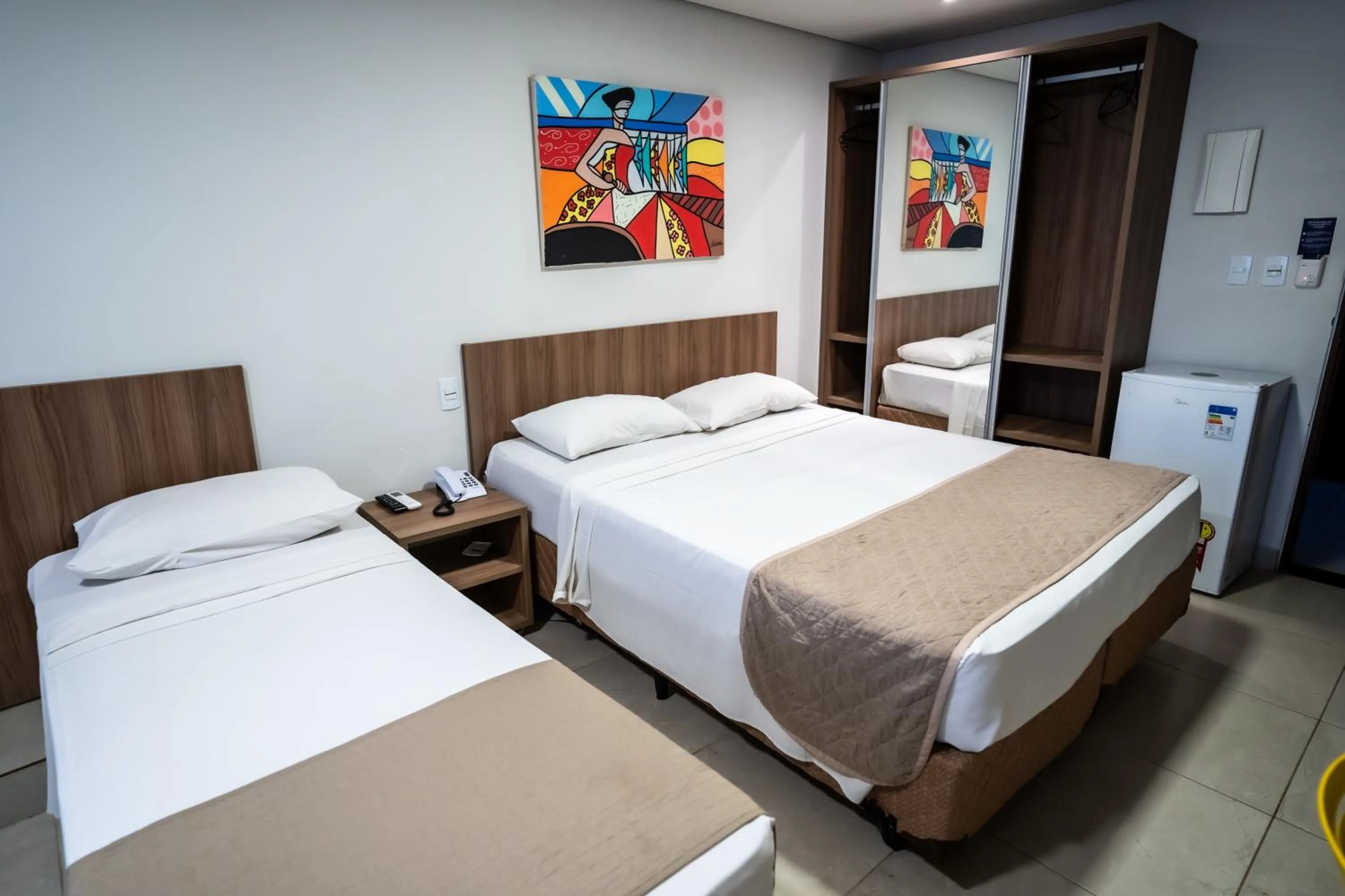 Bed in Bessa Beach Hotel