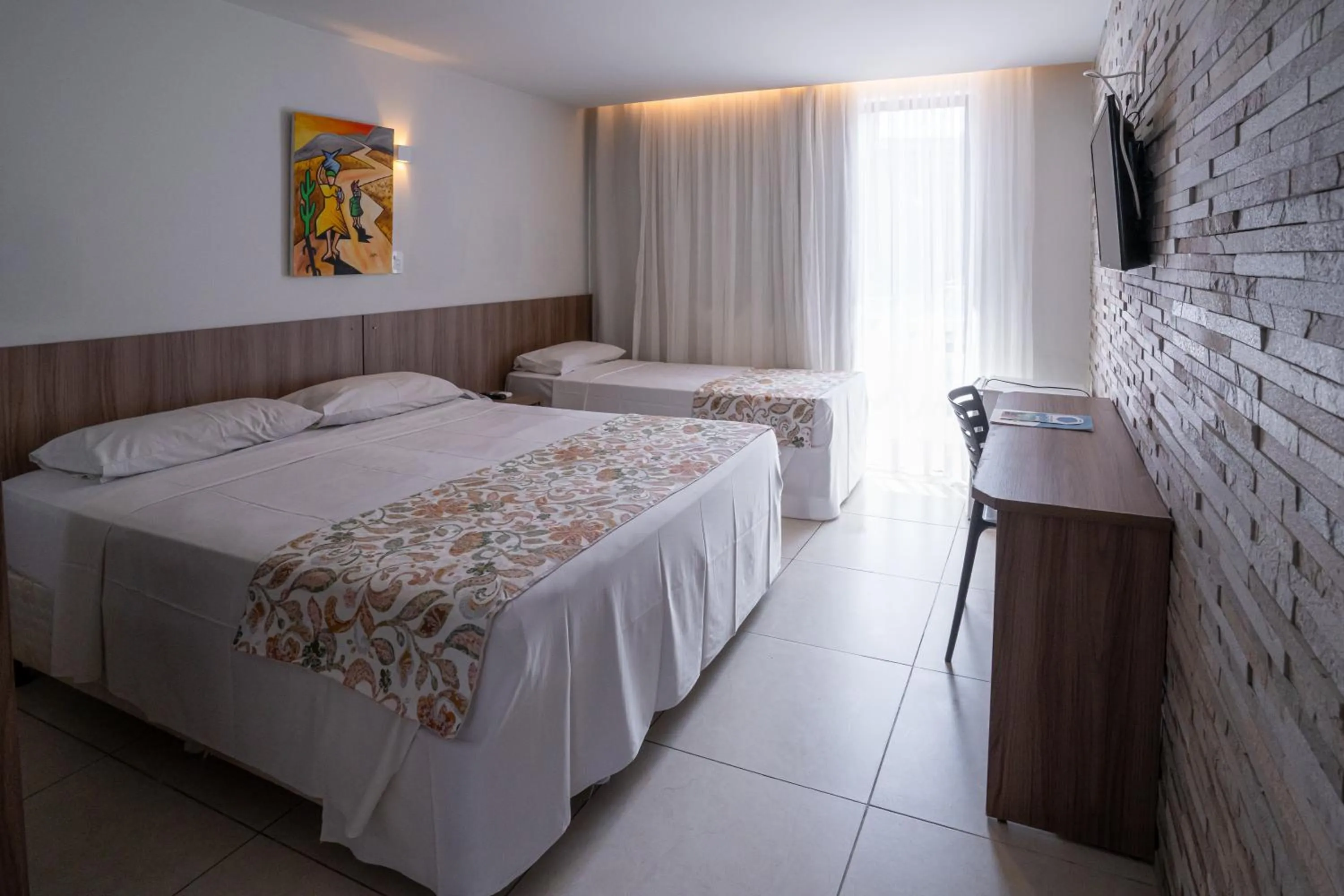 Bed in Bessa Beach Hotel