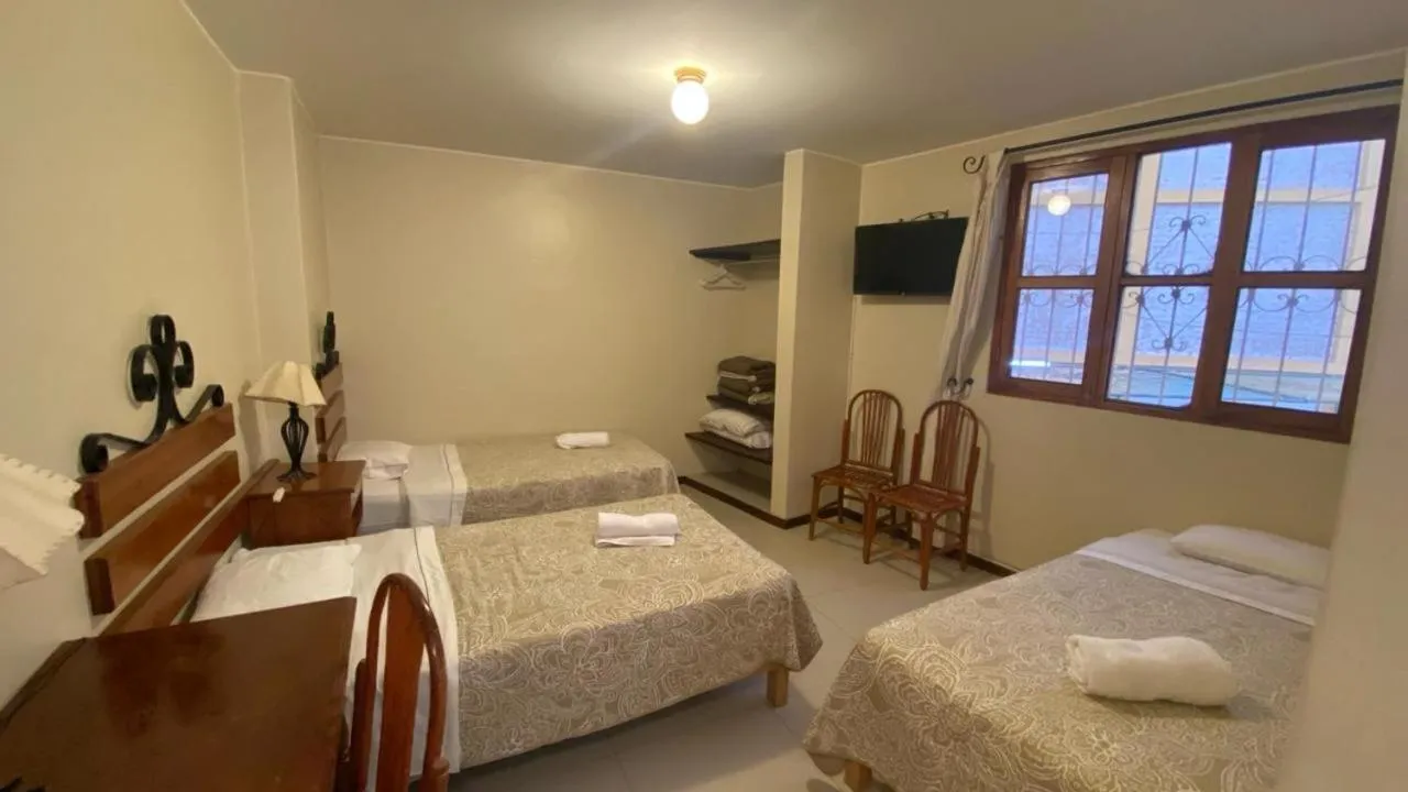 Bed in Hosteria Suiza