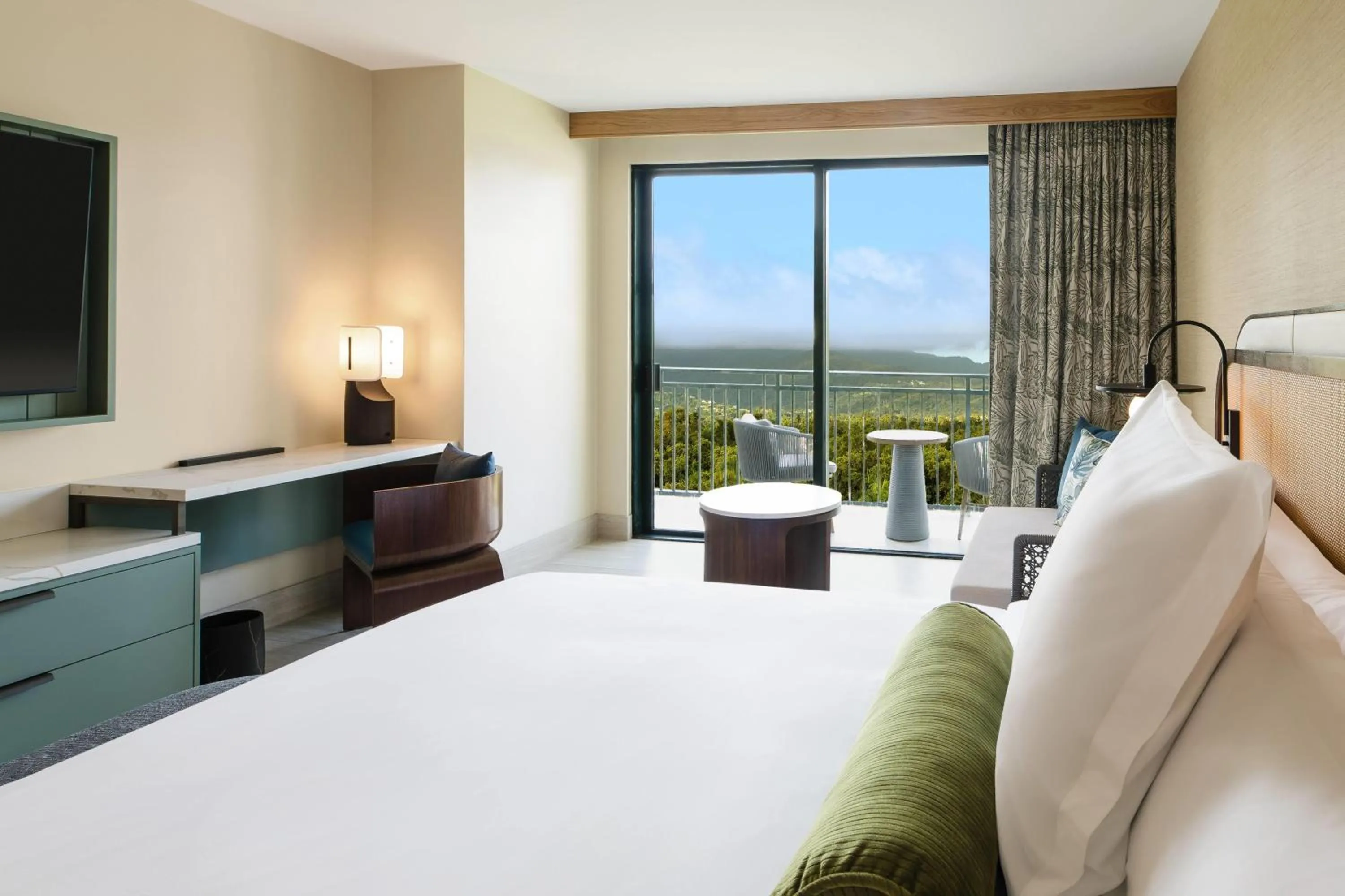 Photo of the whole room, Bed in Wyndham Grand Rio Mar Rainforest Beach and Golf Resort