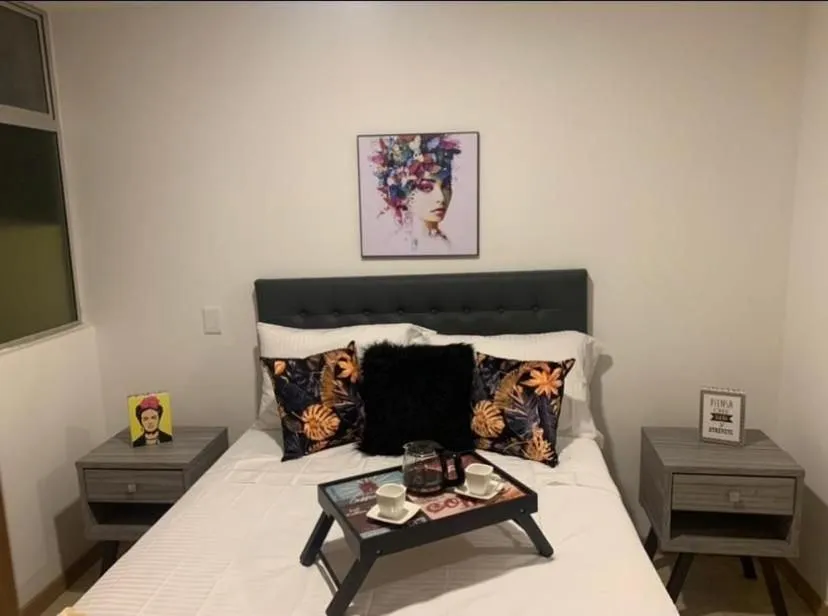 Bed in Apartamentos Avenida del malecón, frente al lago. Guatape