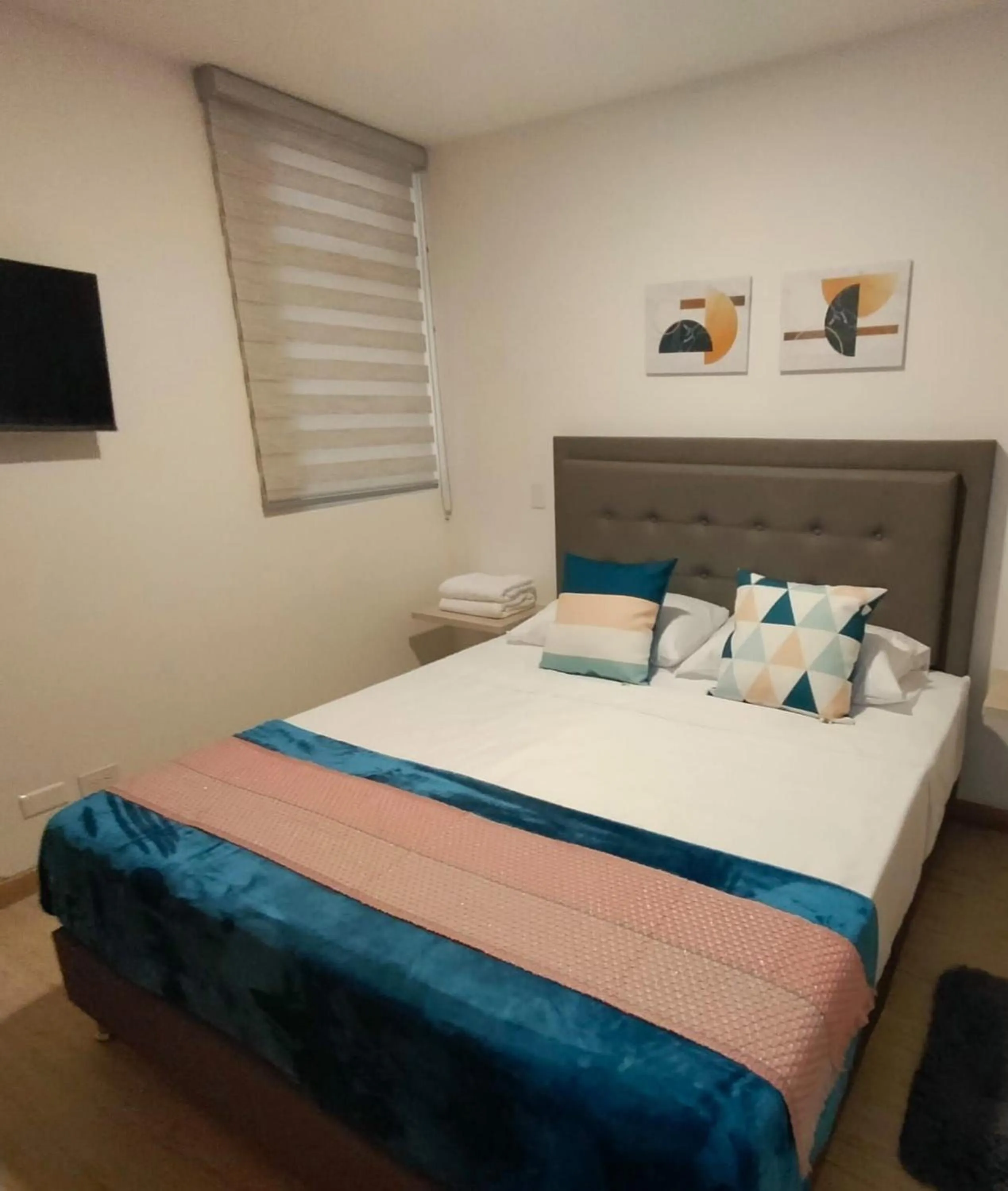 Photo of the whole room, Bed in Apartamentos Avenida del malecón, frente al lago. Guatape