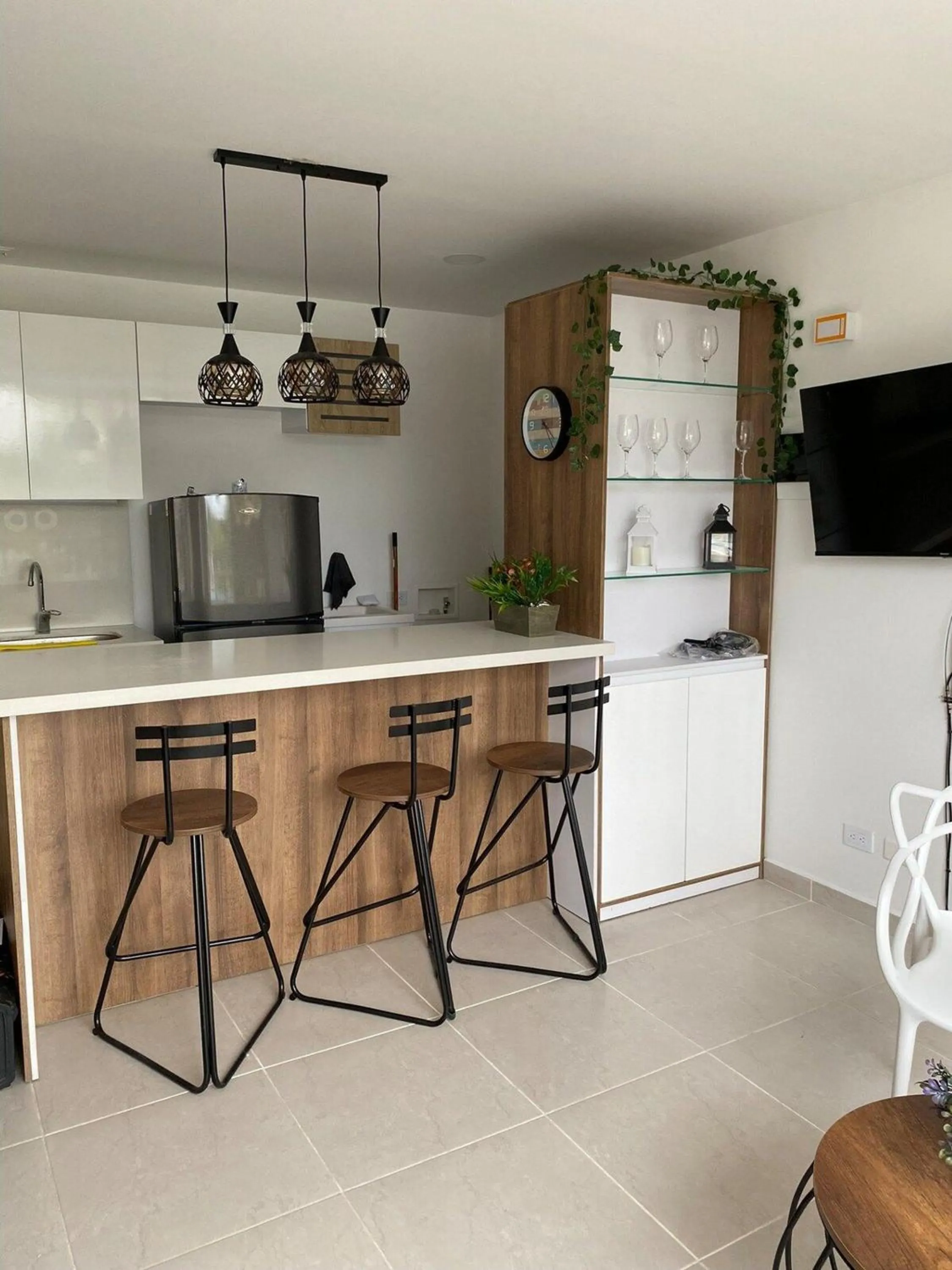Kitchen or kitchenette in Apartamentos Avenida del malecón, frente al lago. Guatape