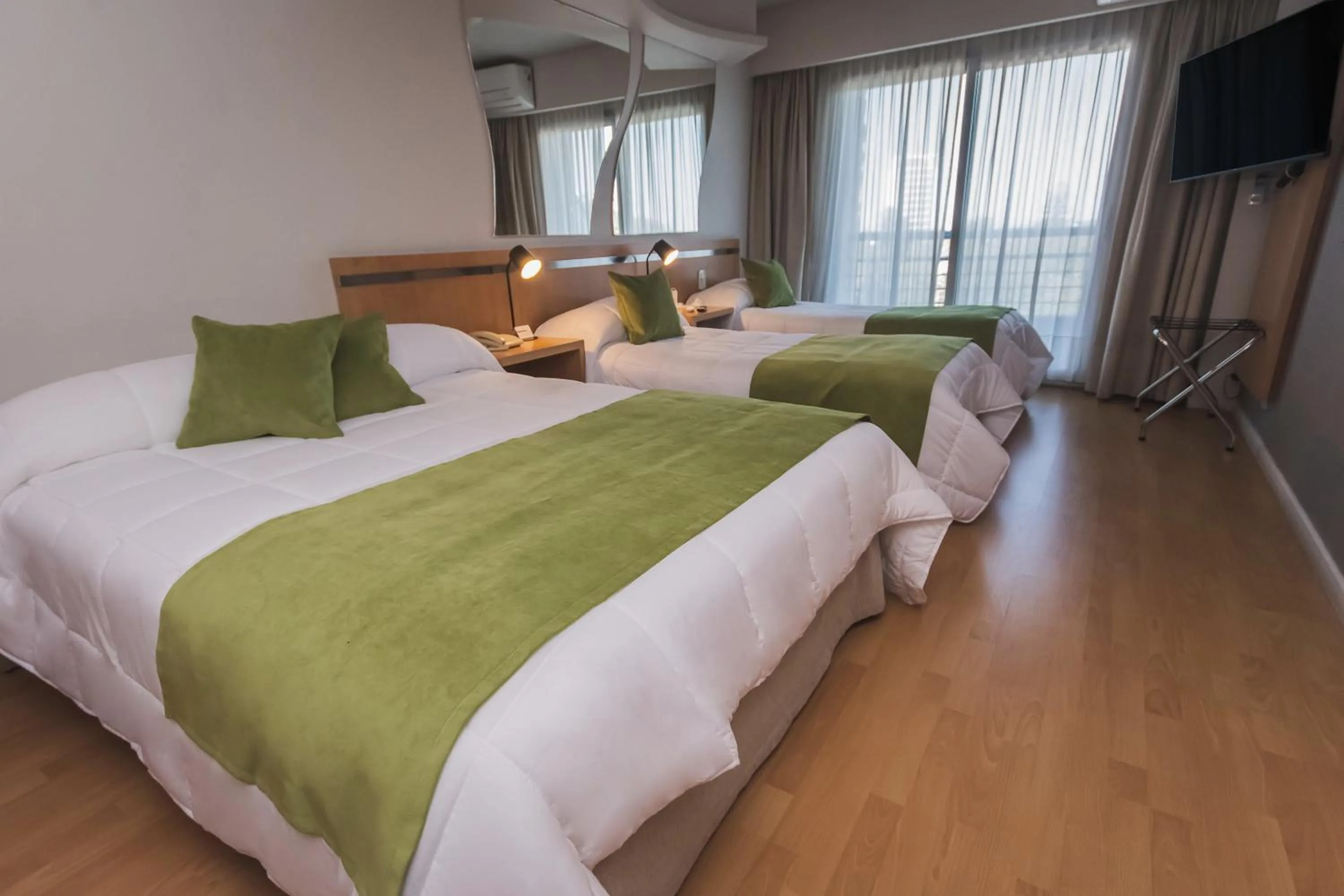 Bed in Maran Suites & Towers