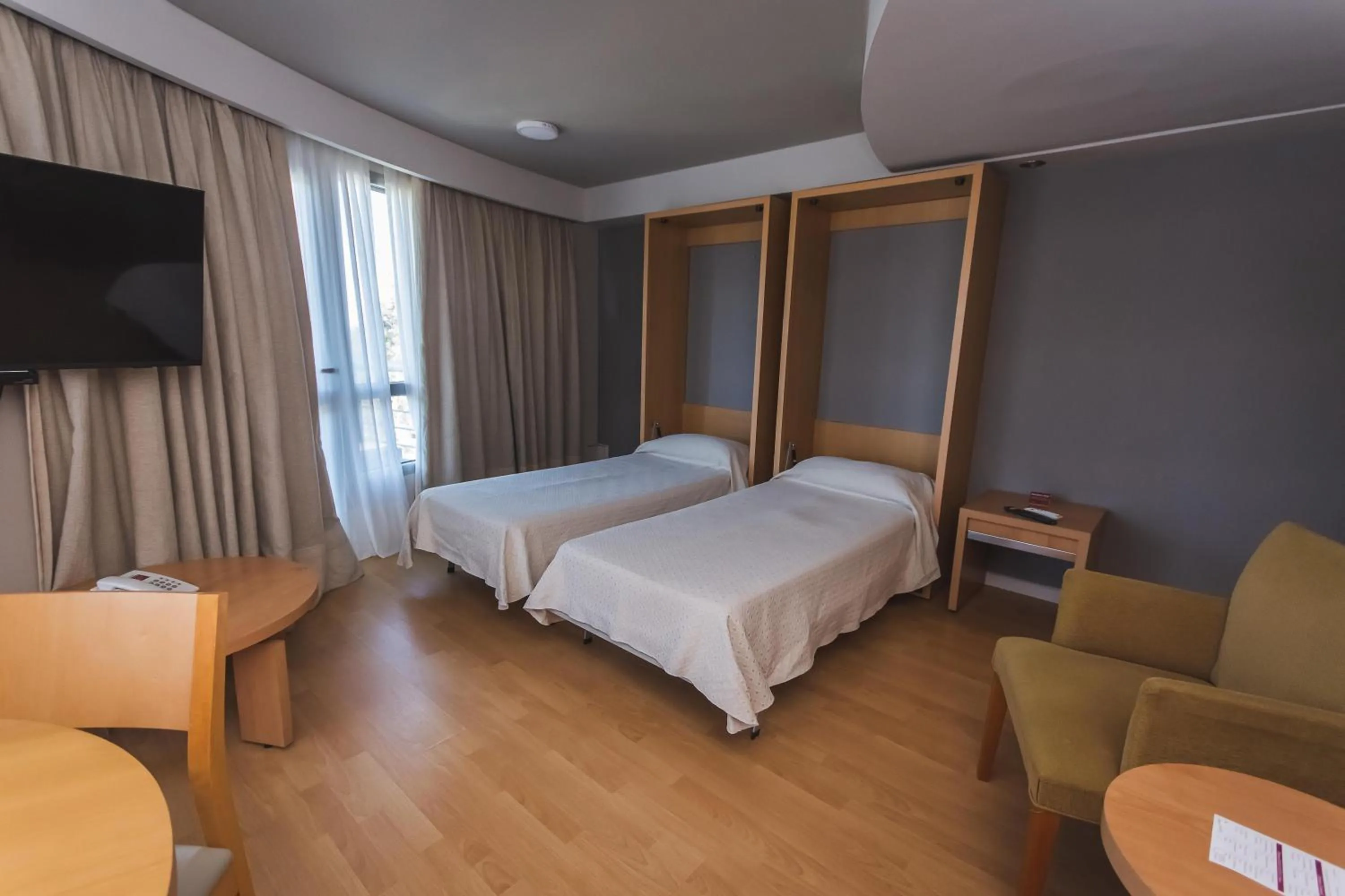 Bedroom, Bed in Maran Suites & Towers