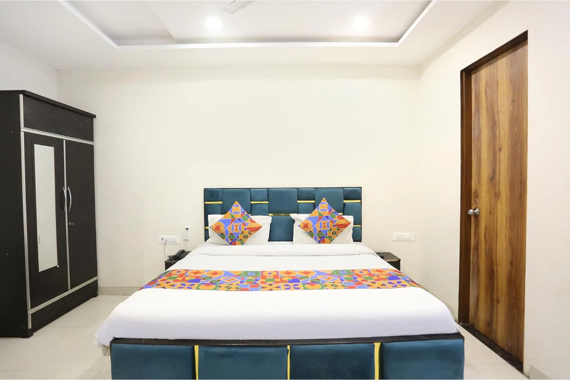 Bed in FabHotel Shiv Rachna - Mansarovar