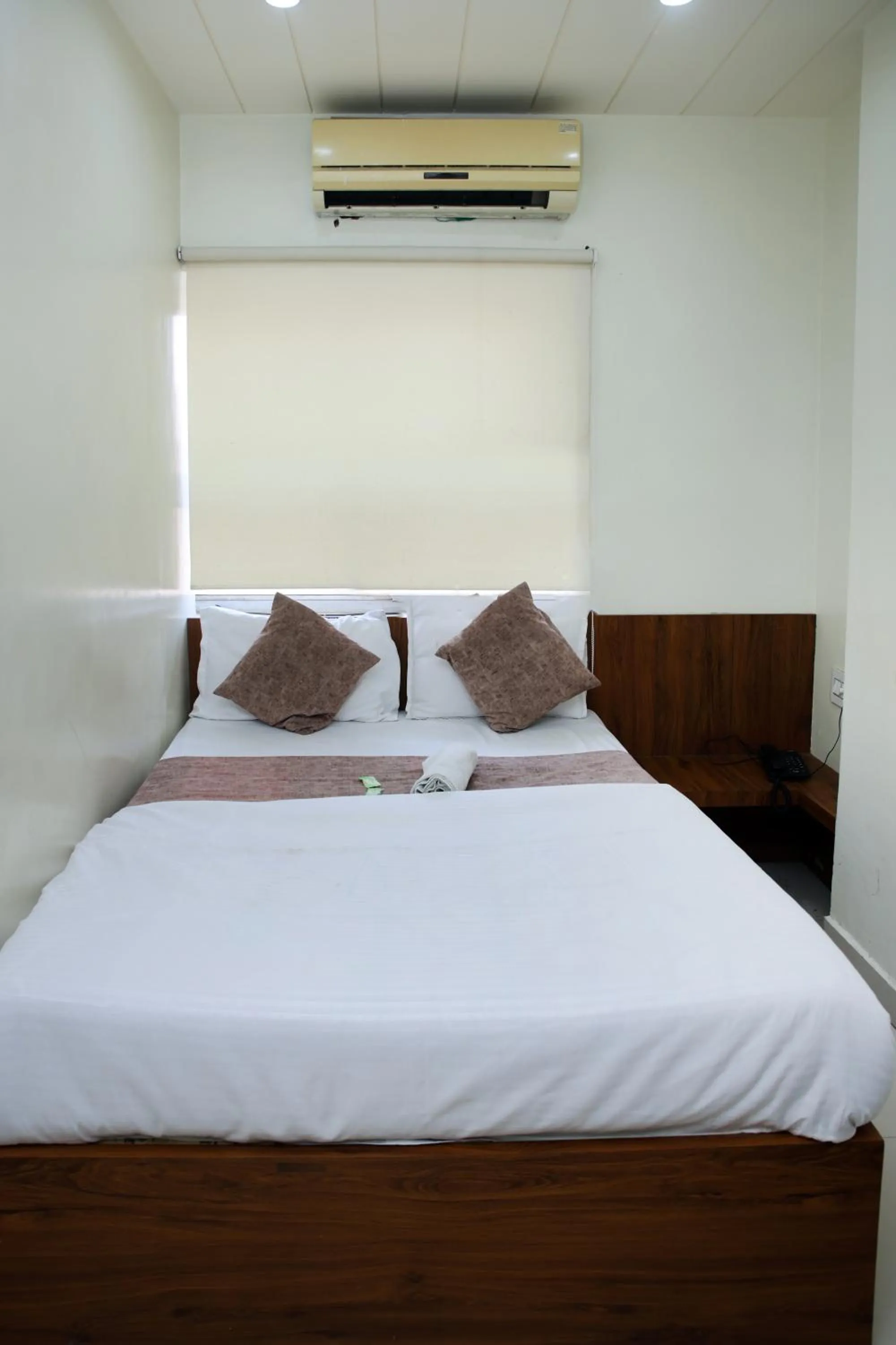 Bed in Hotel Siddhi Vinayak