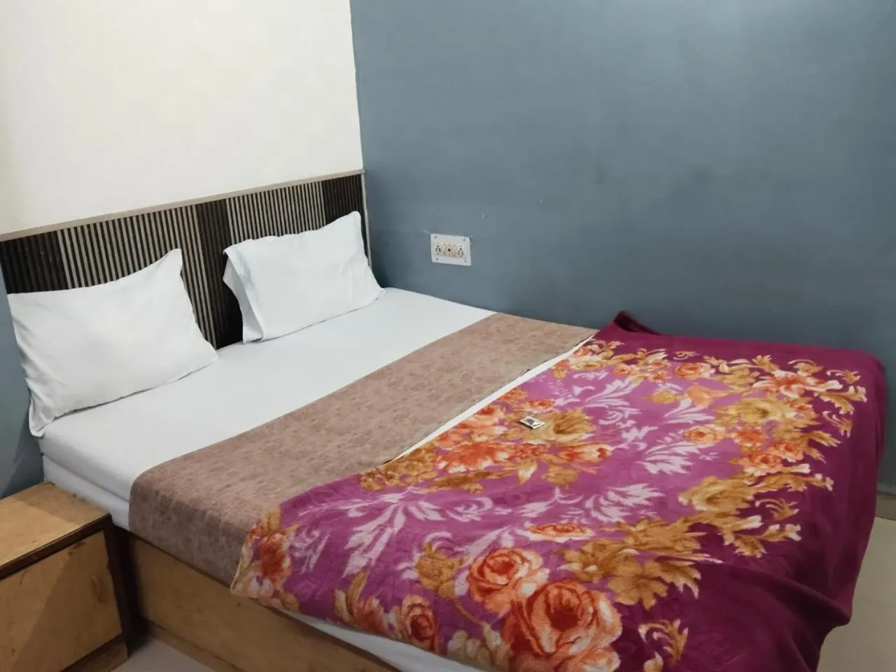 Bed in Hotel Siddhi Vinayak