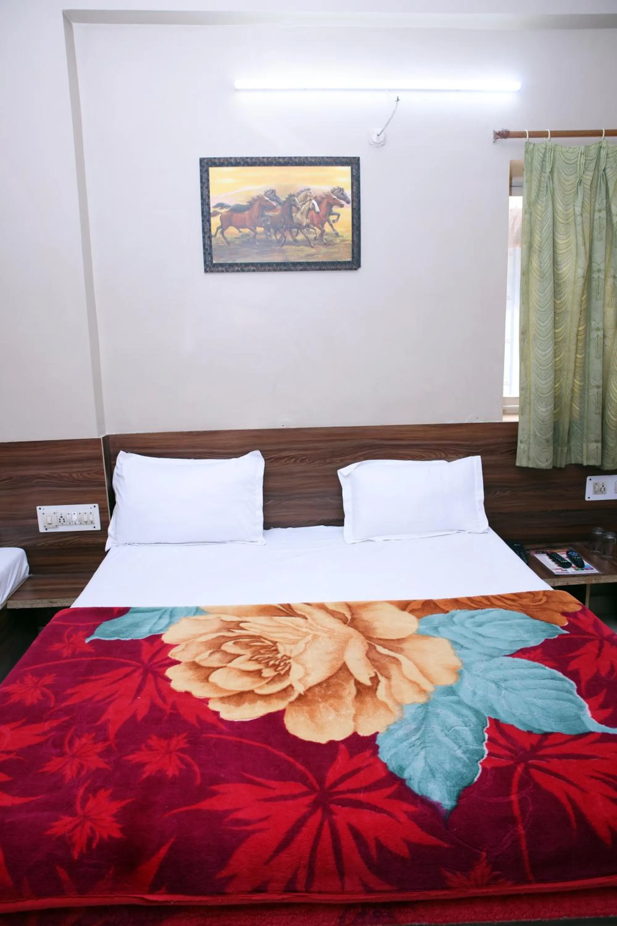 Bed in Hotel Siddhi Vinayak