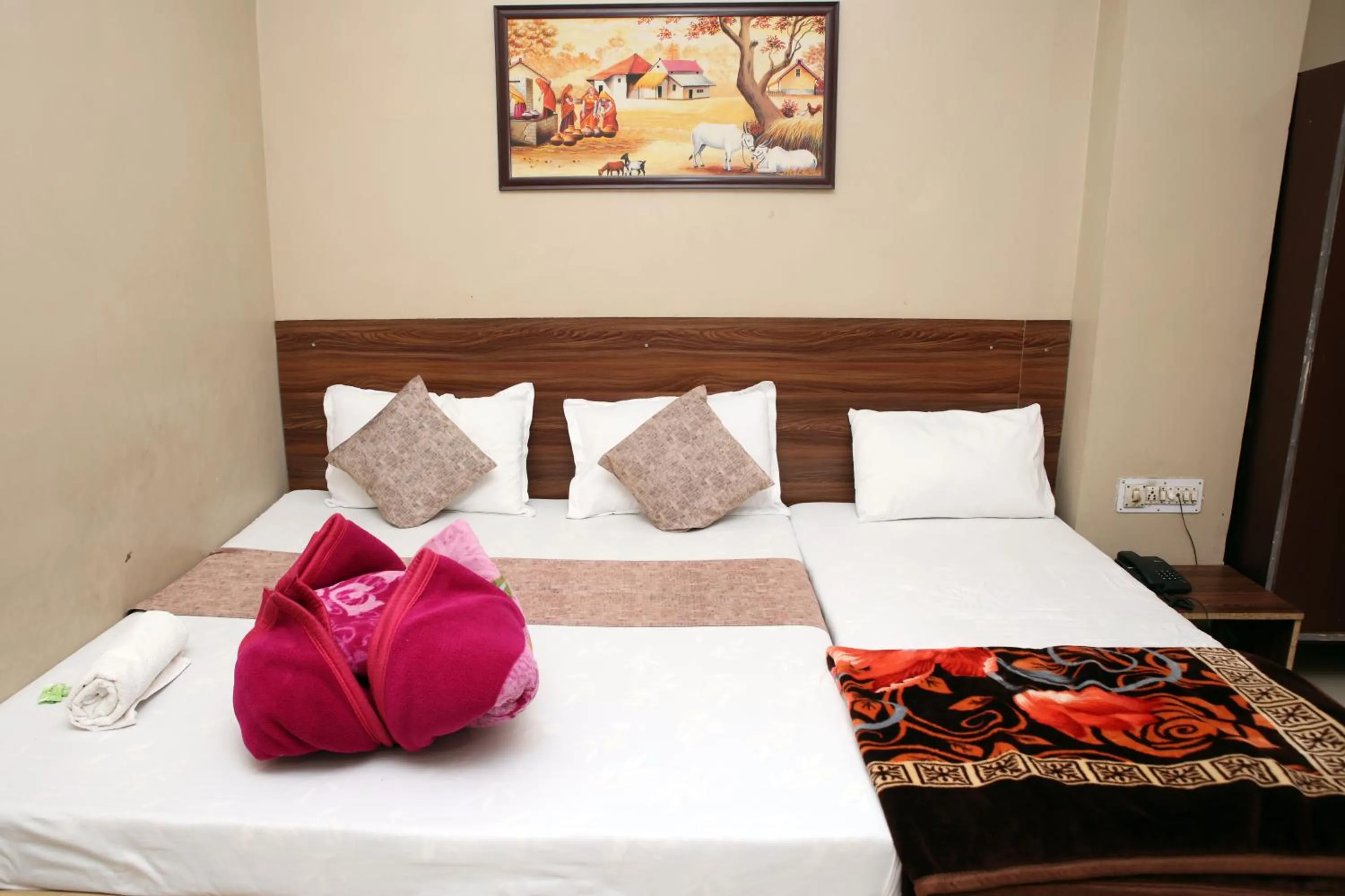 Bed in Hotel Siddhi Vinayak