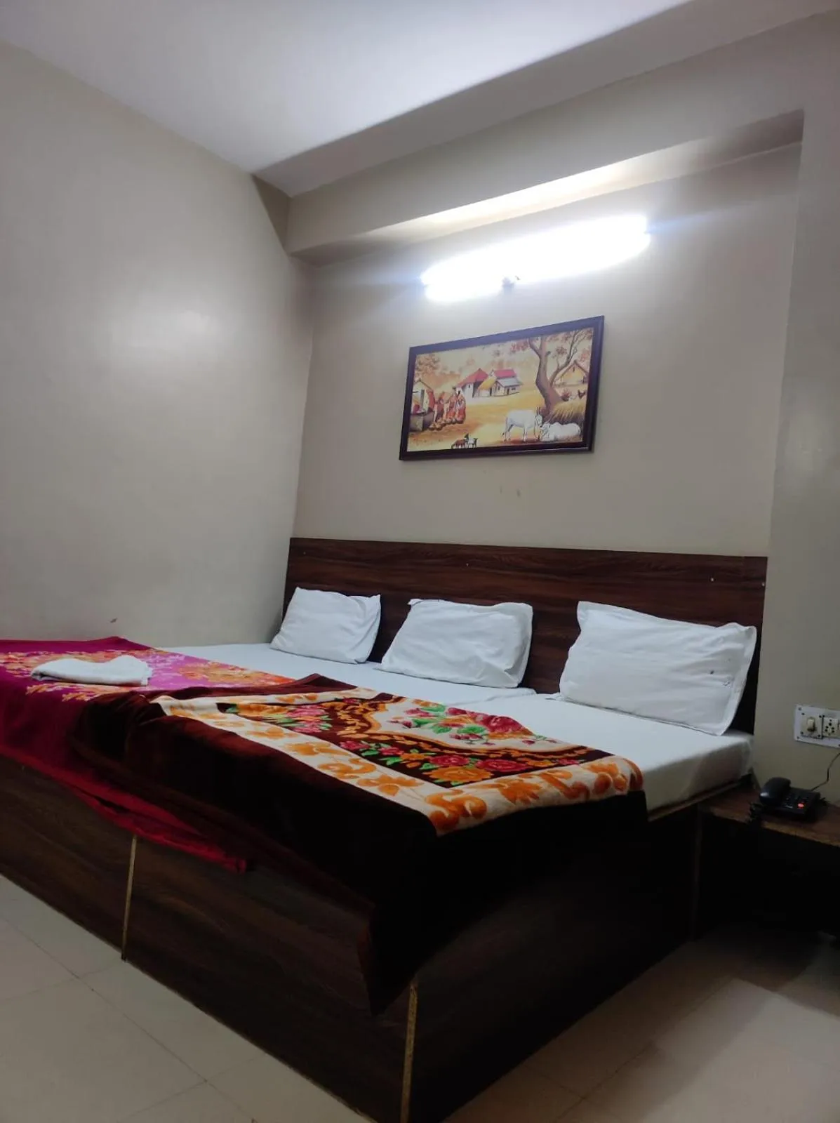 Bed in Hotel Siddhi Vinayak