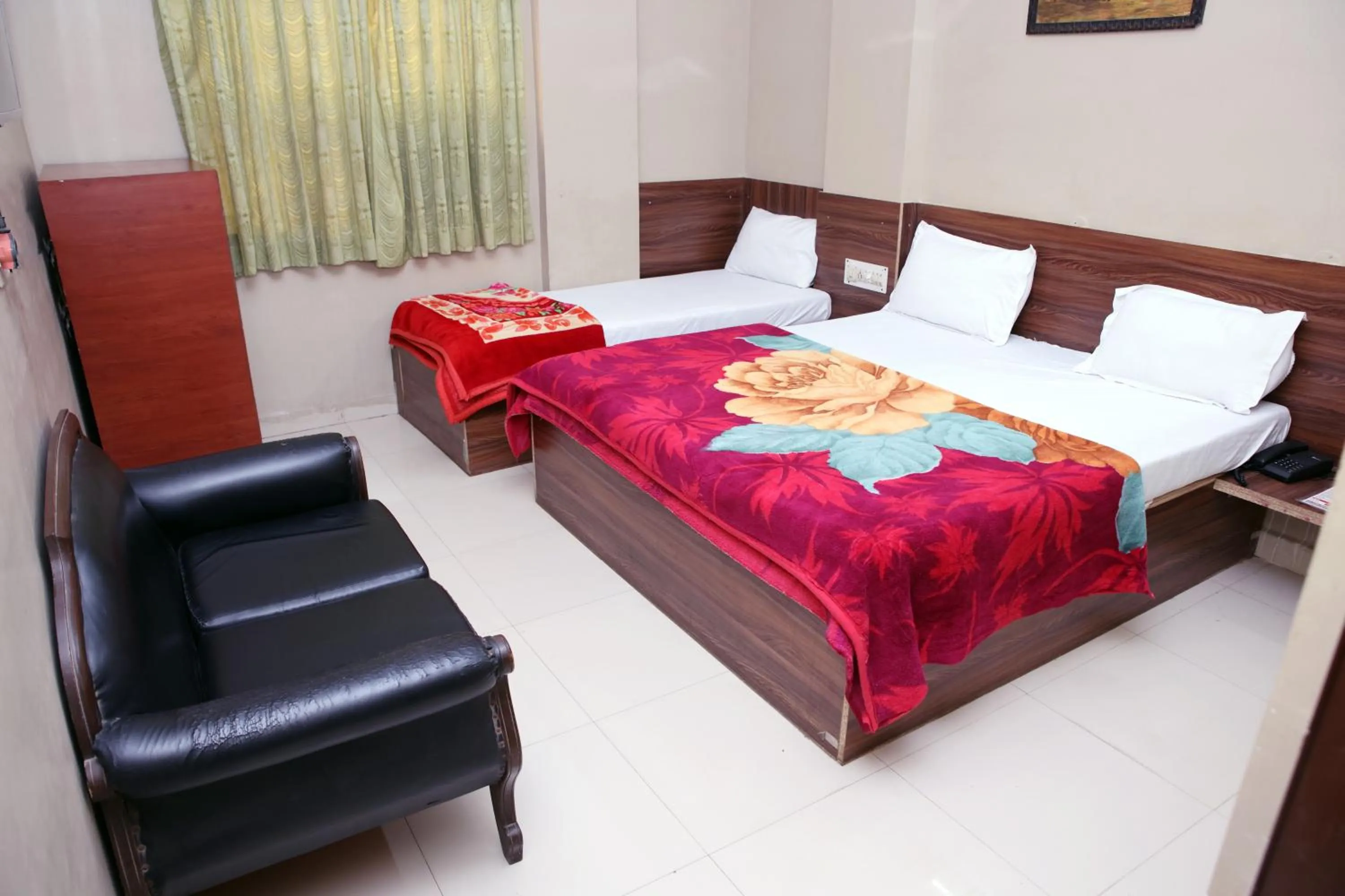 Bed in Hotel Siddhi Vinayak