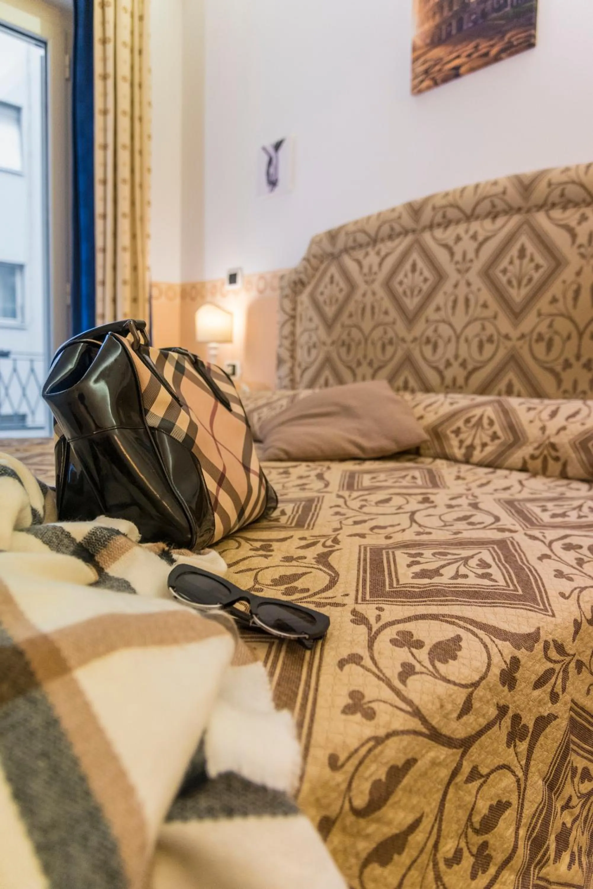 Bed in Gregorio's Rooms