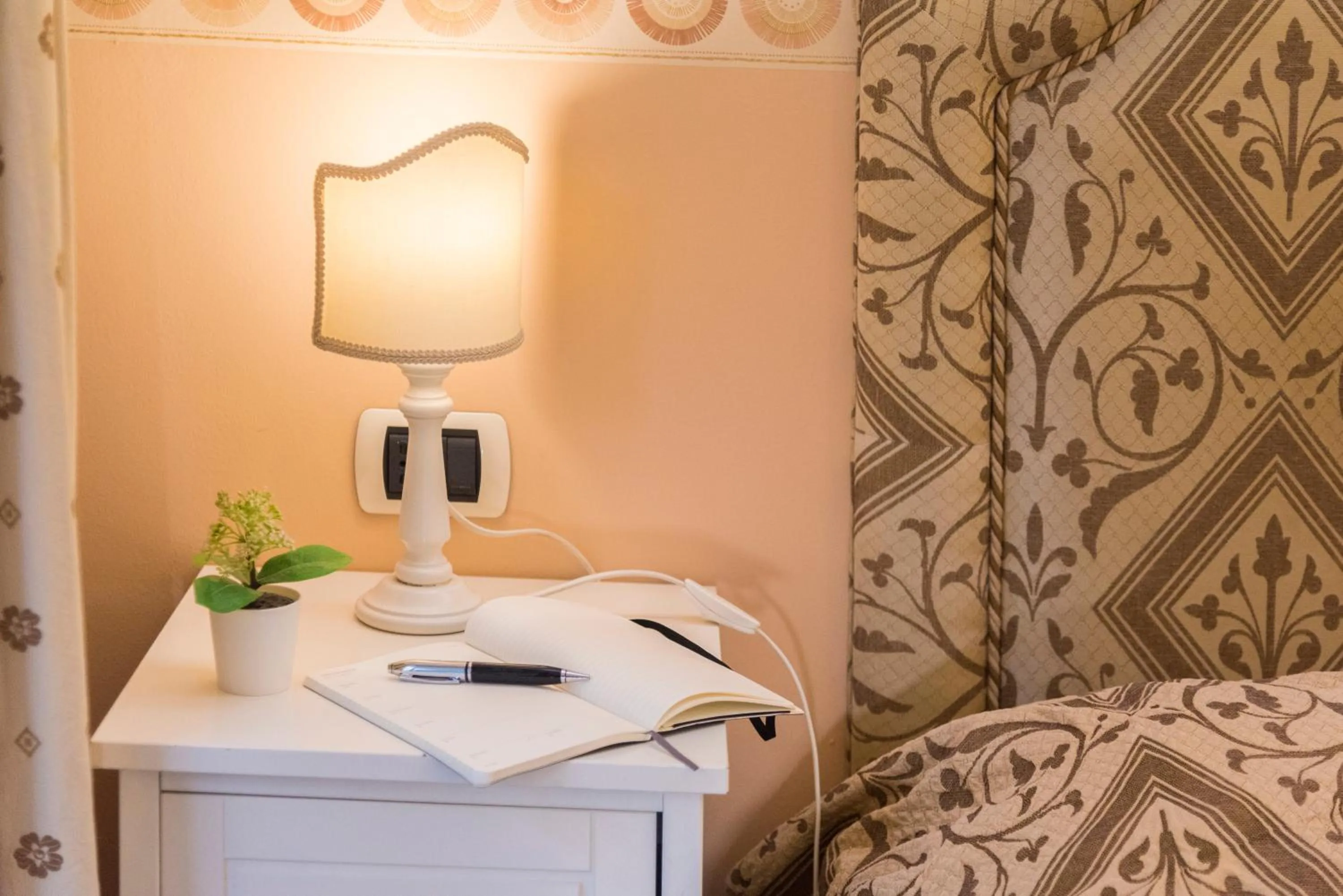 Bed in Gregorio's Rooms