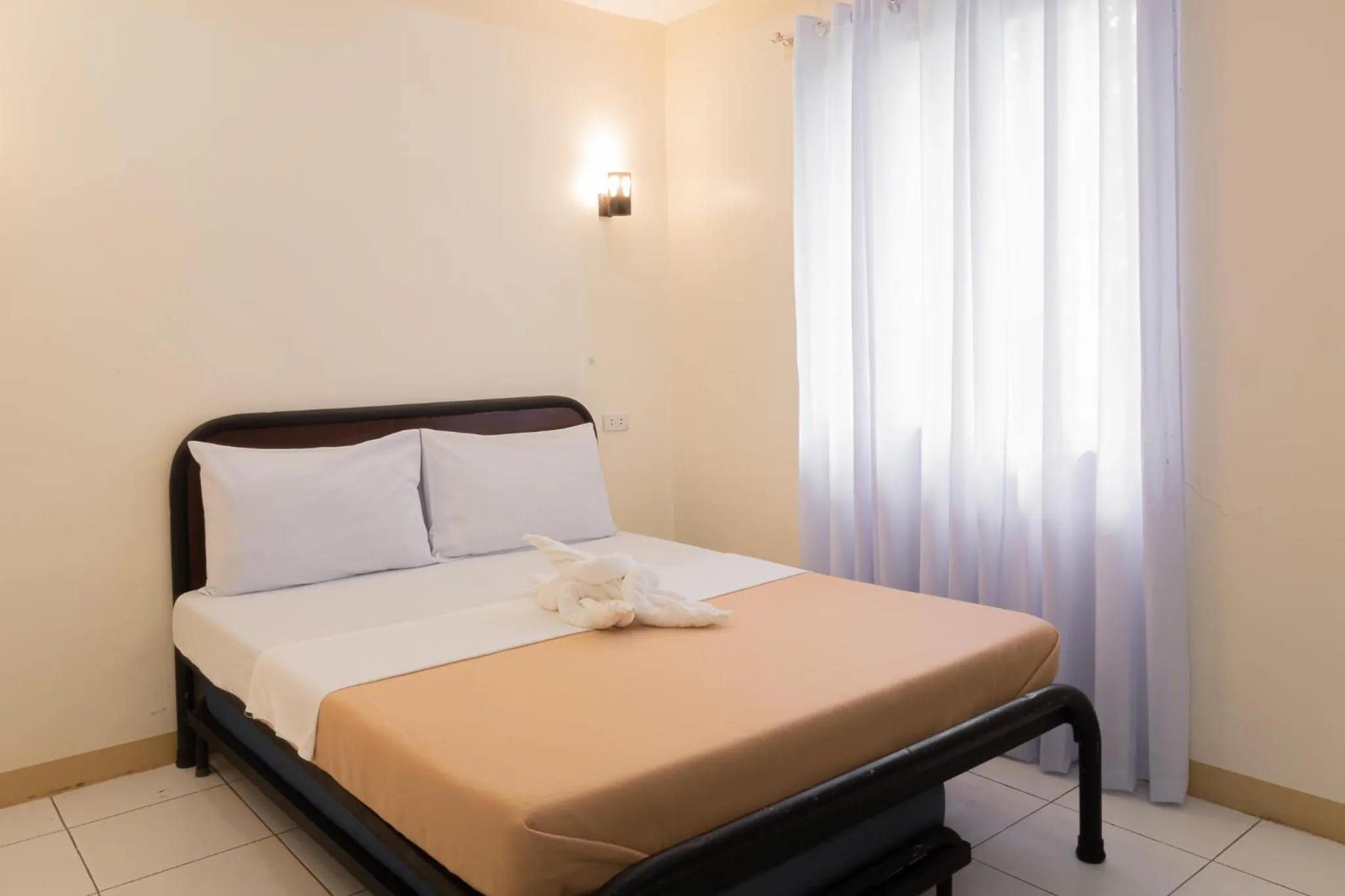 Bed in Almira Diving Resort- Panglao