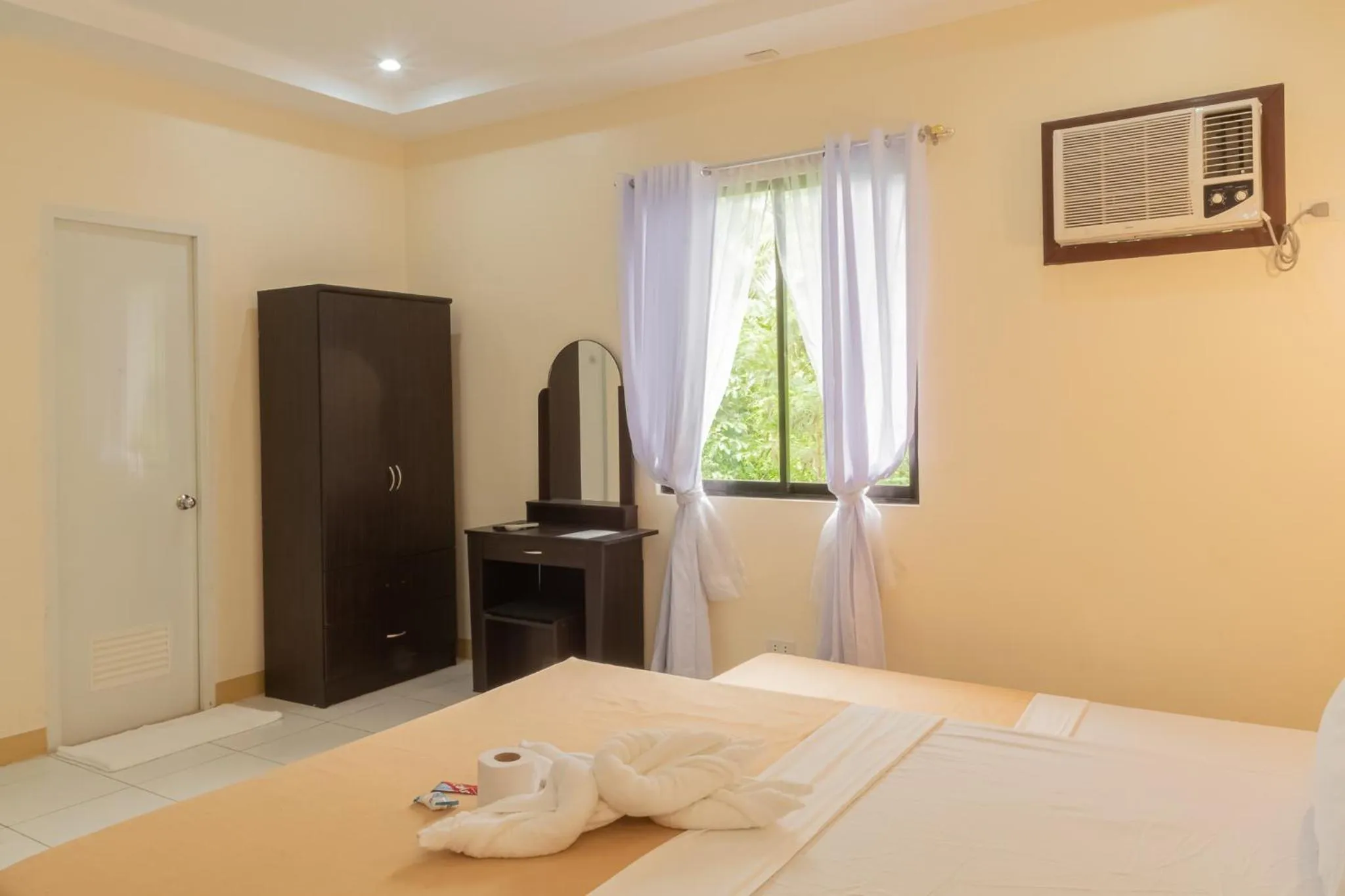 Bed in Almira Diving Resort- Panglao