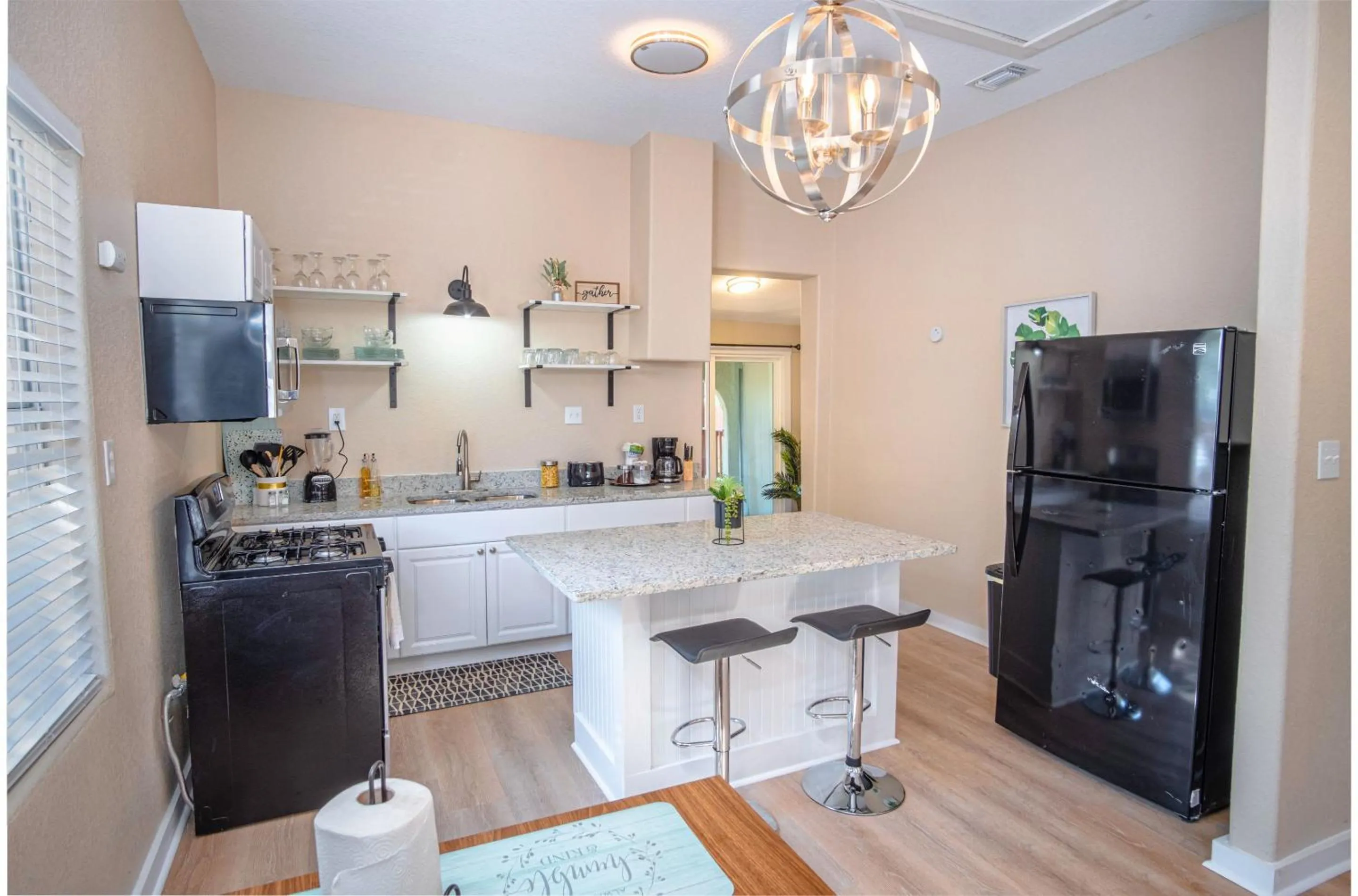 Kitchen or kitchenette in 3 BR1 BA Remodeled Home Near Downtown