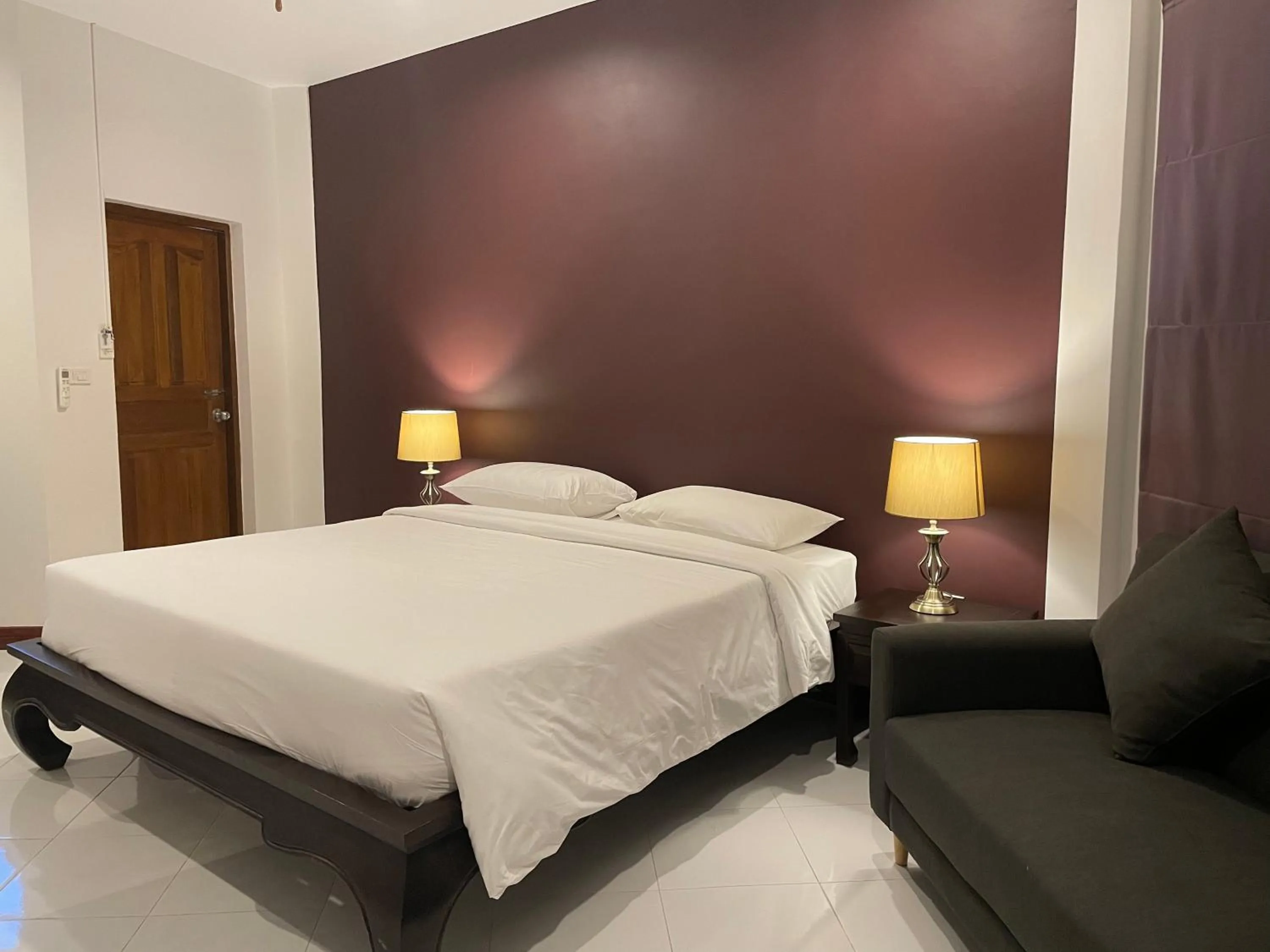 Bed in The Pace Phuket Boutique Resort