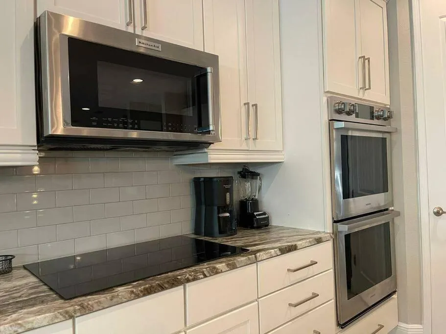 Kitchen or kitchenette in Spectacular 12-Bed Mansion with game room