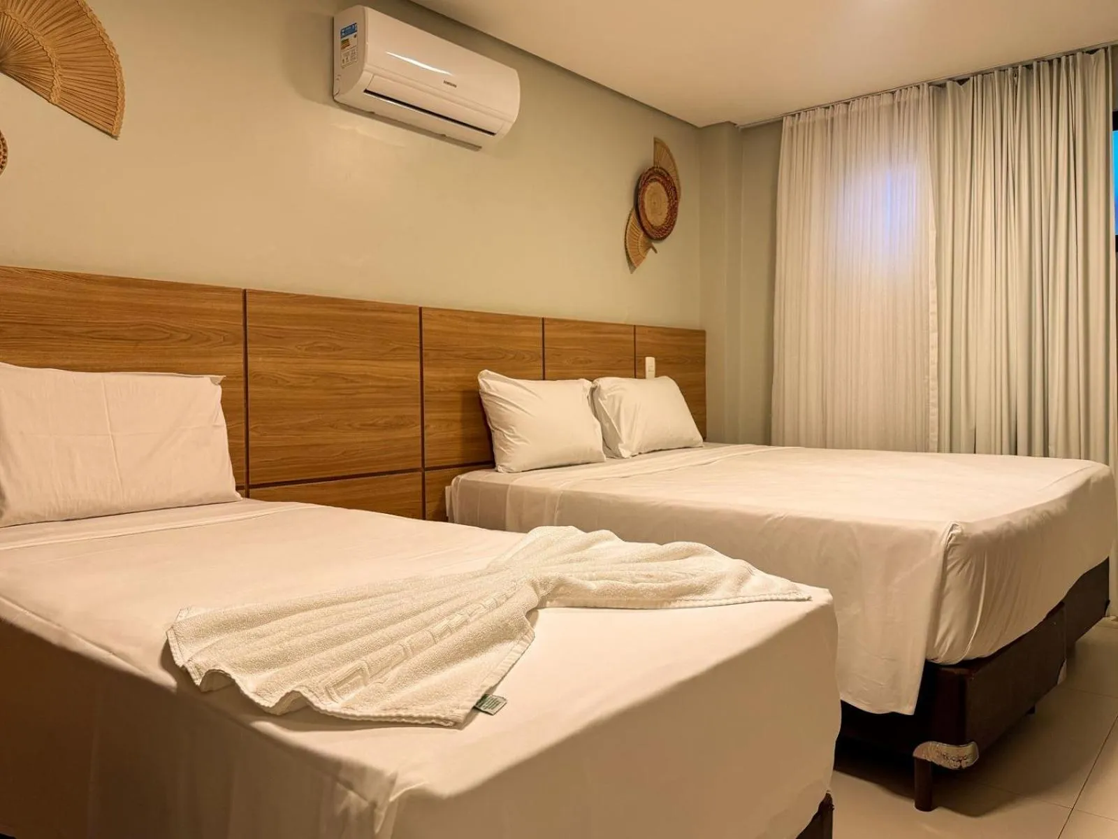 Bed in Paraiso Beach Hotel