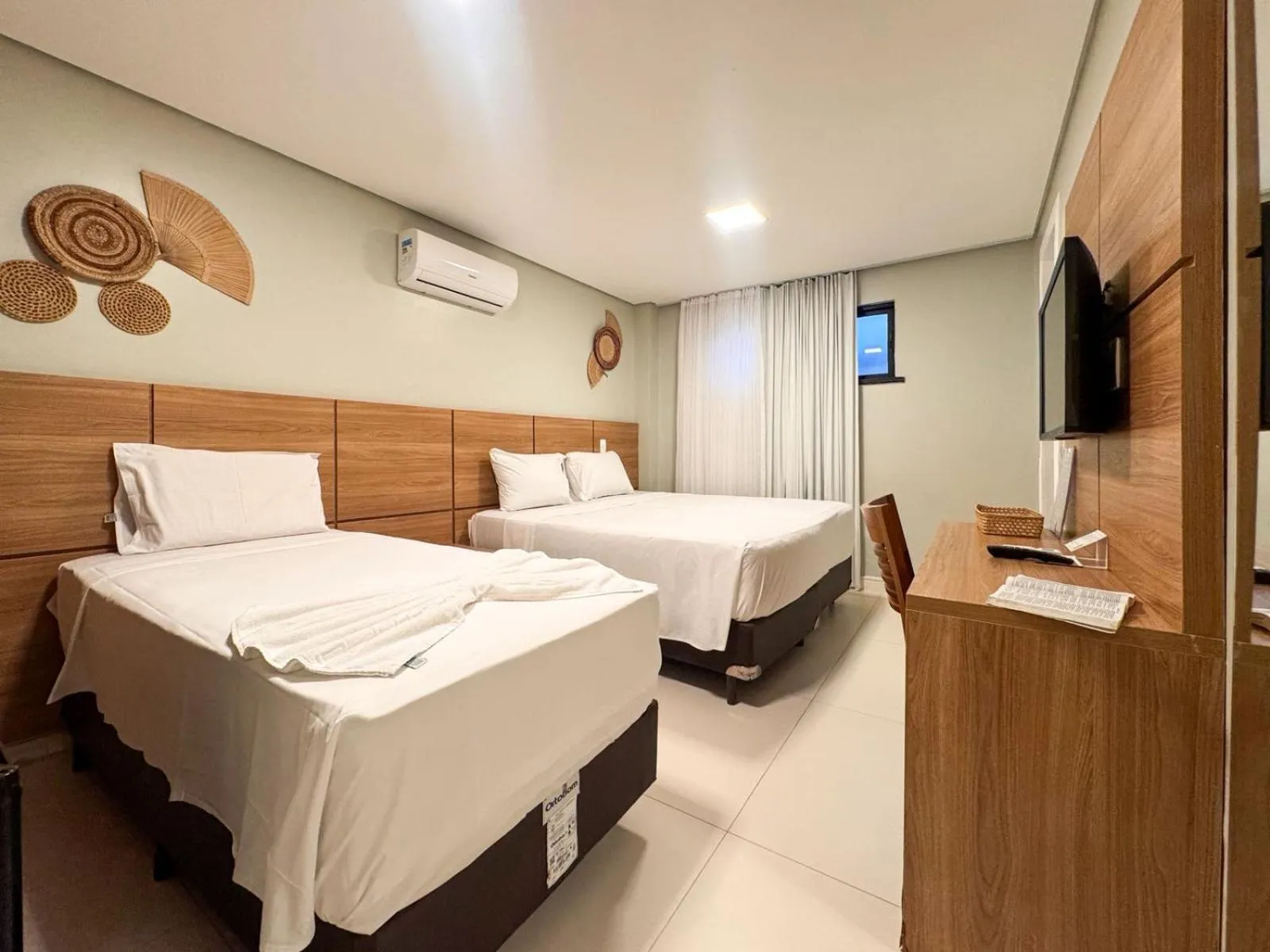 Bed in Paraiso Beach Hotel