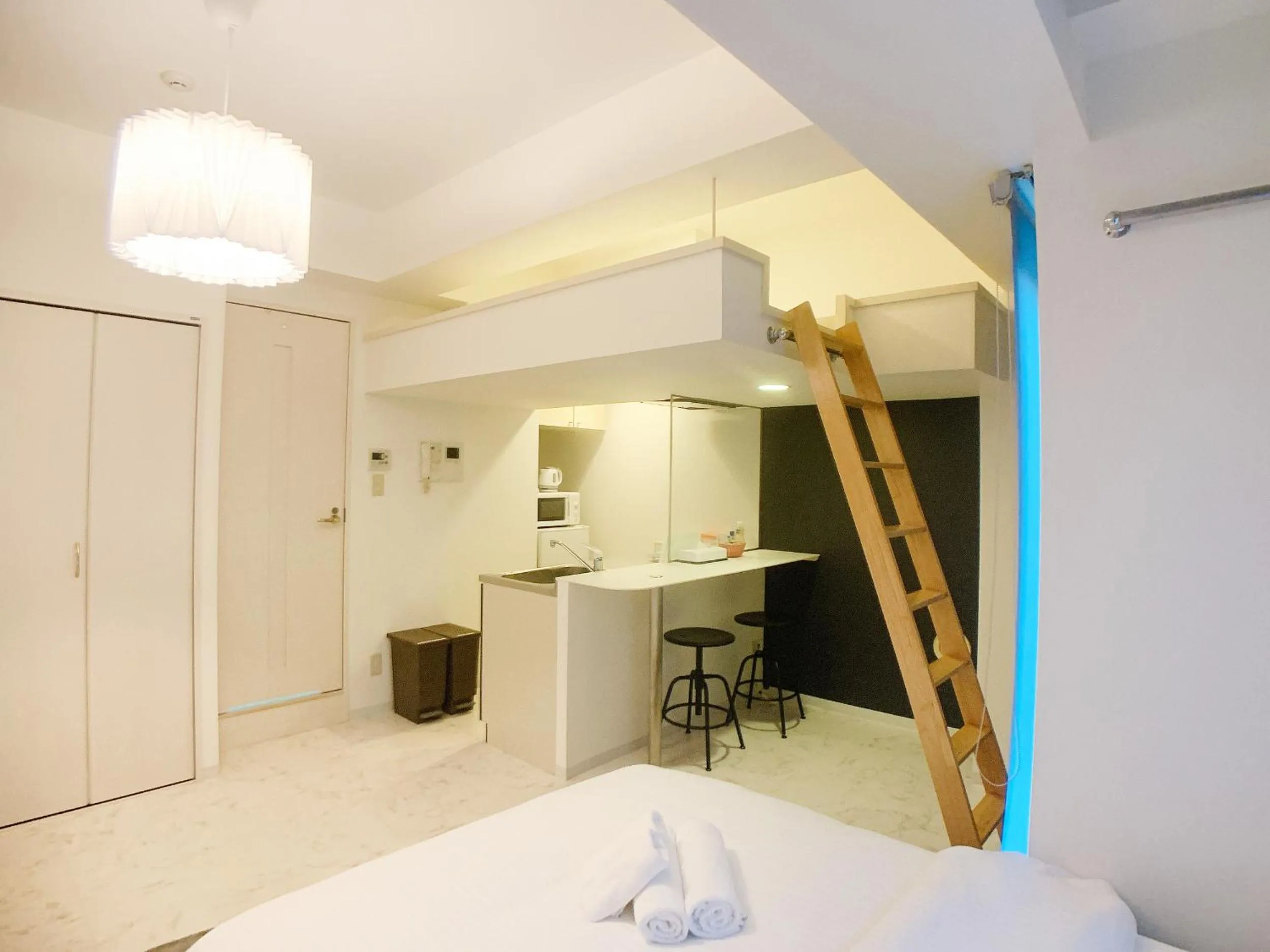 Bed in OUCHI HOTEL Fujimi