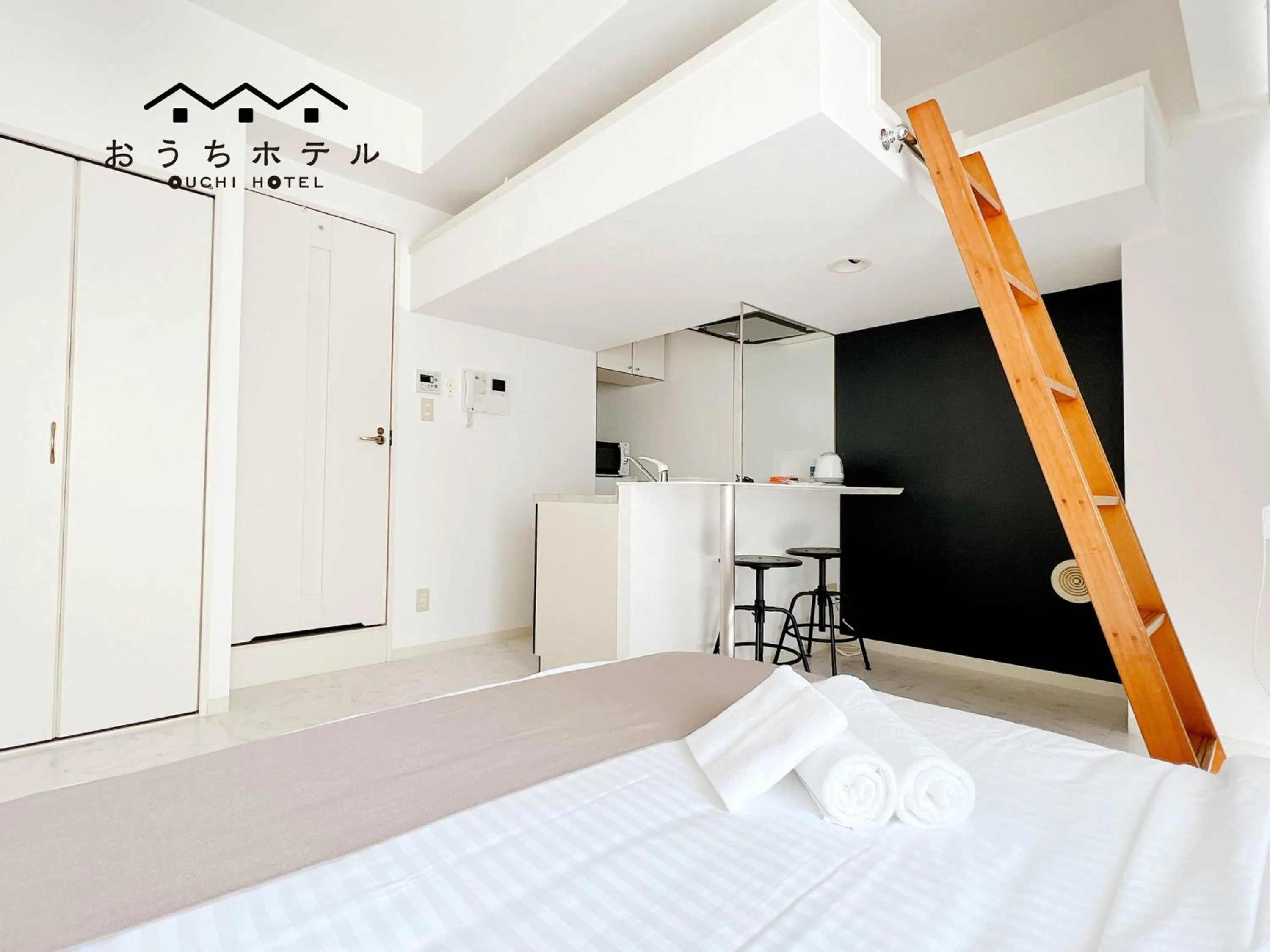 Bed in OUCHI HOTEL Fujimi