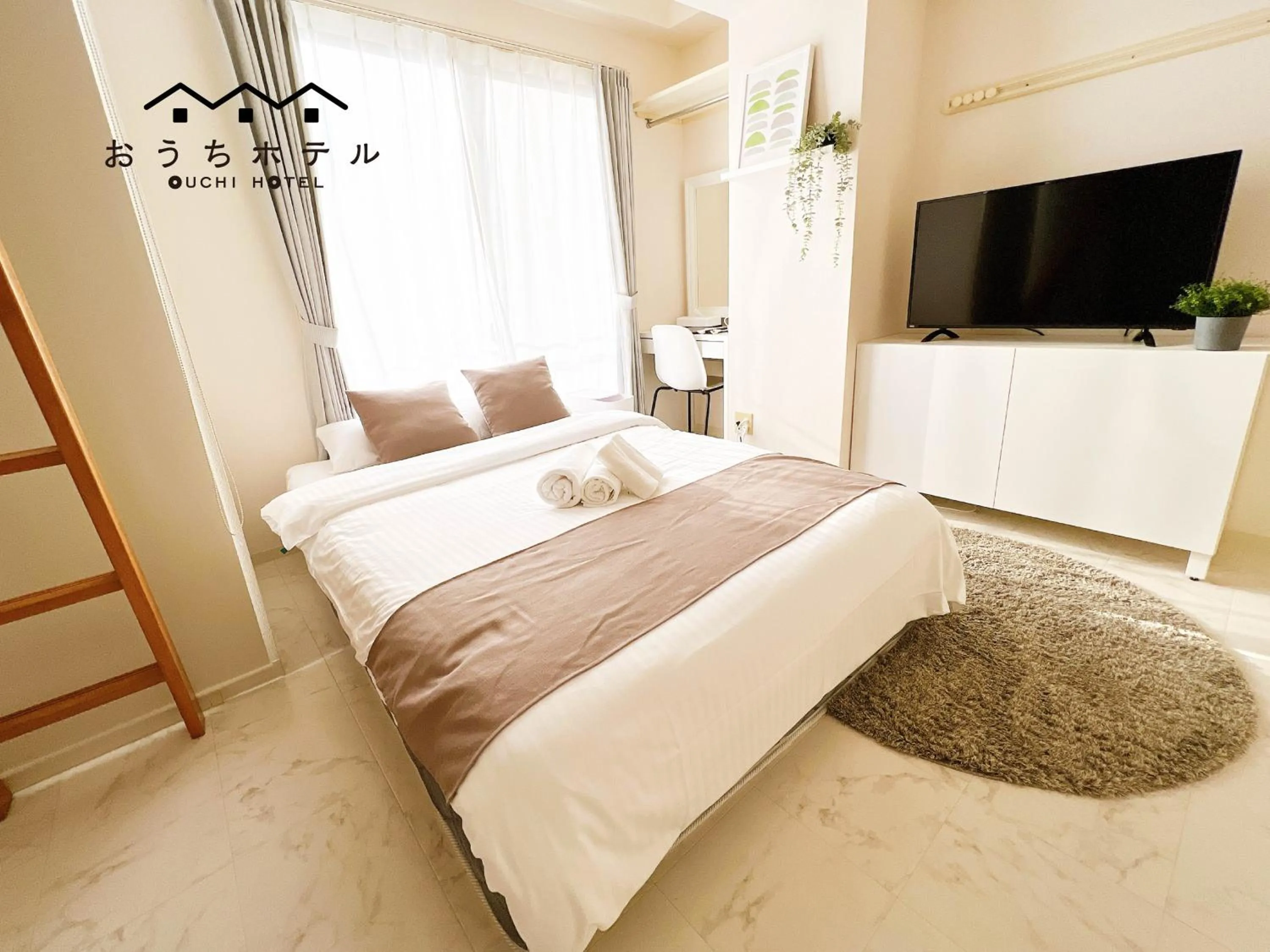 Bed in OUCHI HOTEL Fujimi