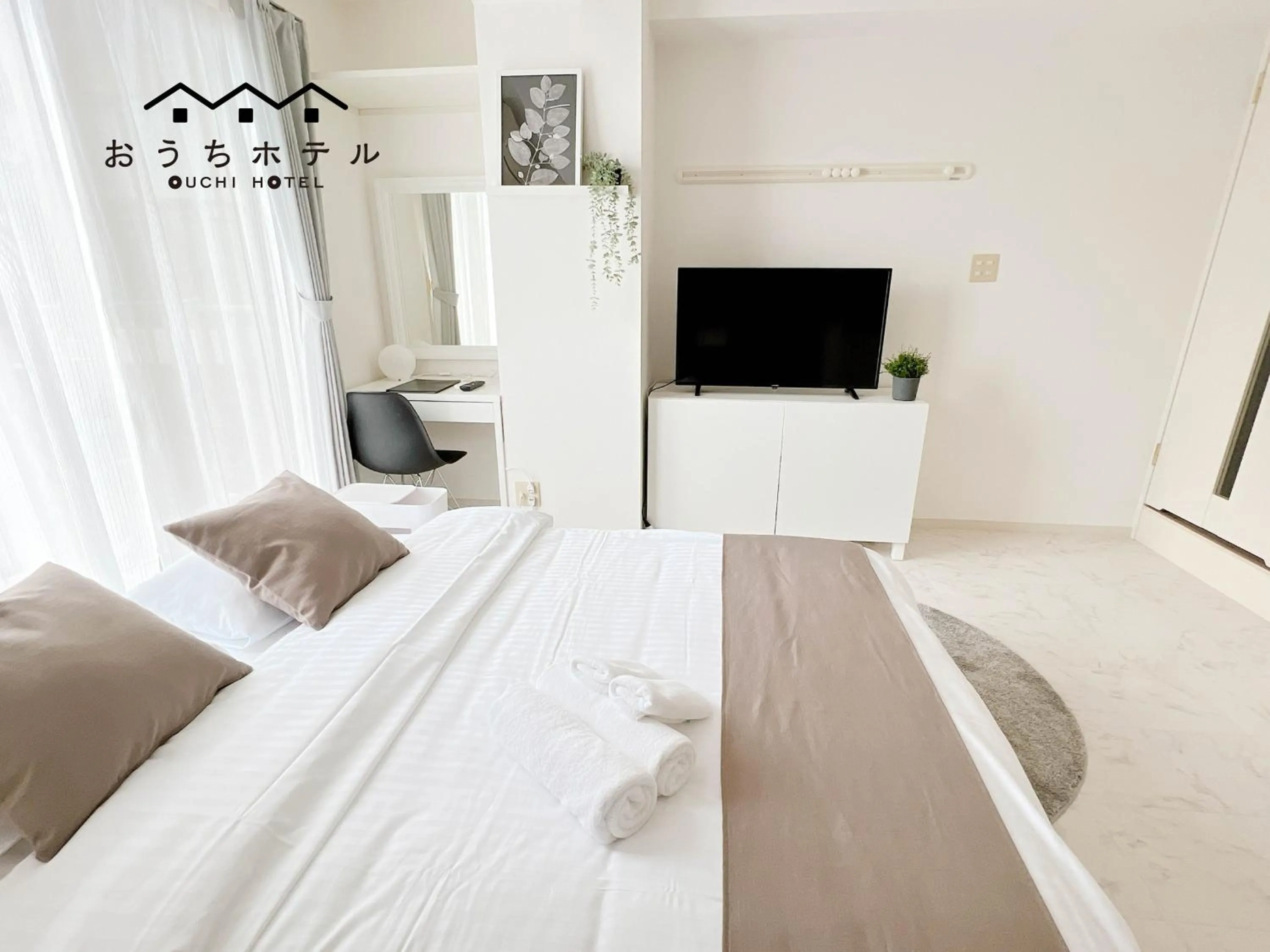 Bed in OUCHI HOTEL Fujimi