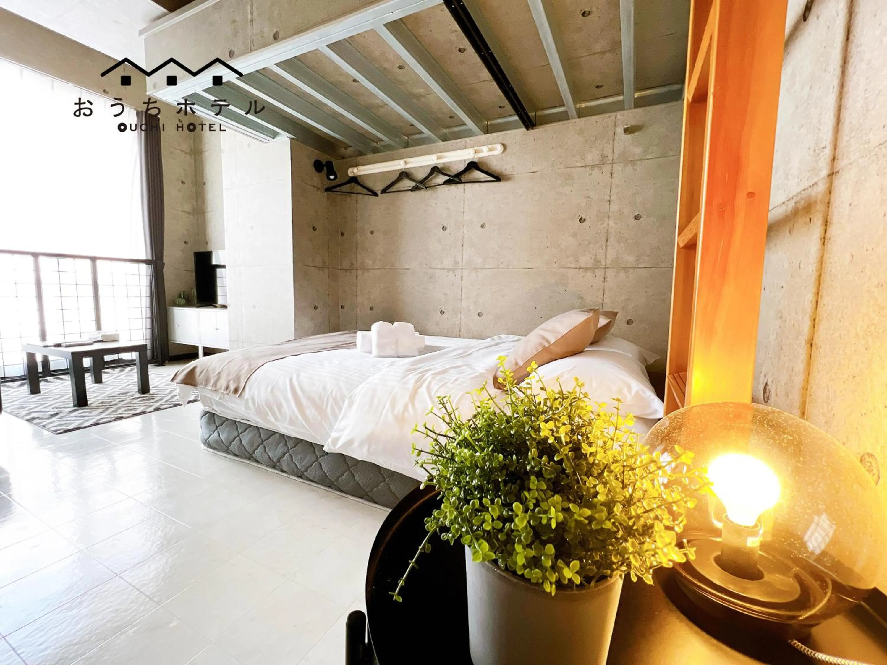 Bed in OUCHI HOTEL Fujimi