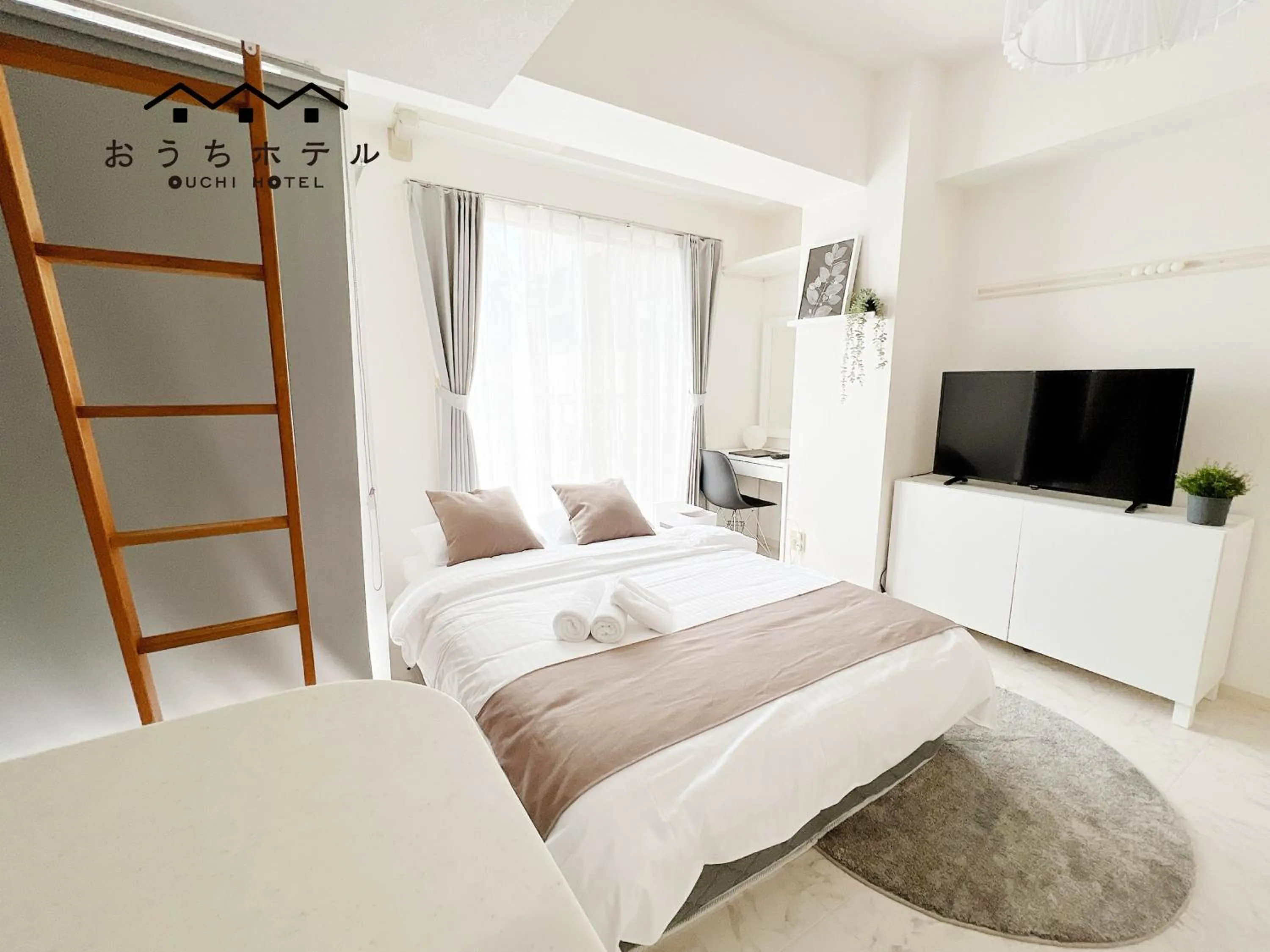 Bed in OUCHI HOTEL Fujimi