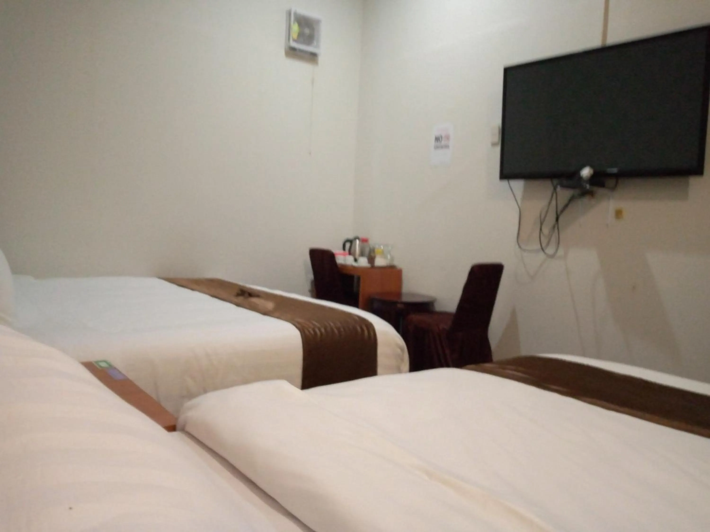Bed in Hotel Belangi Syariah Taakengon Mitra RedDoorz