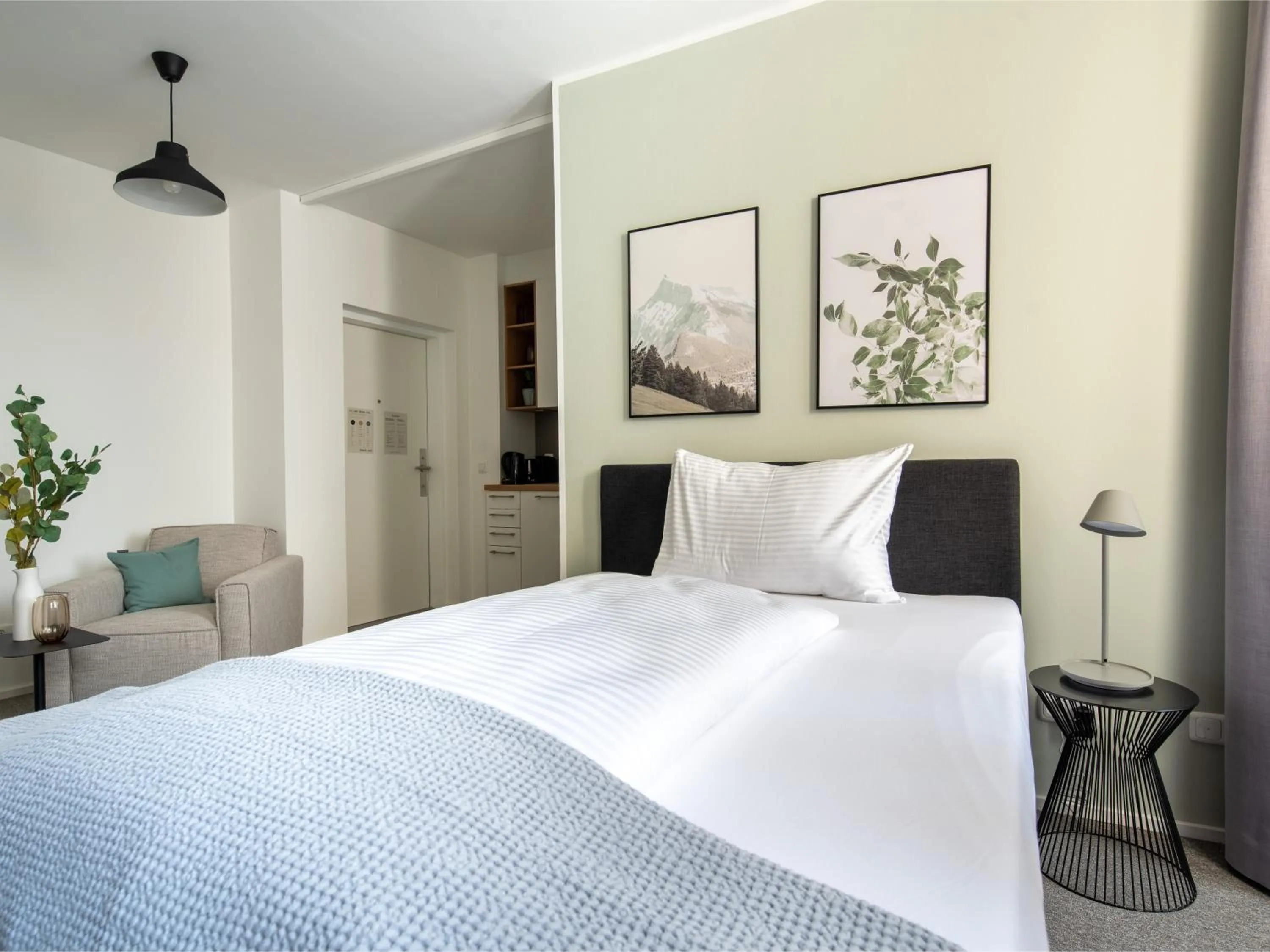 Bed in Limehome Linz Friedrichstraße