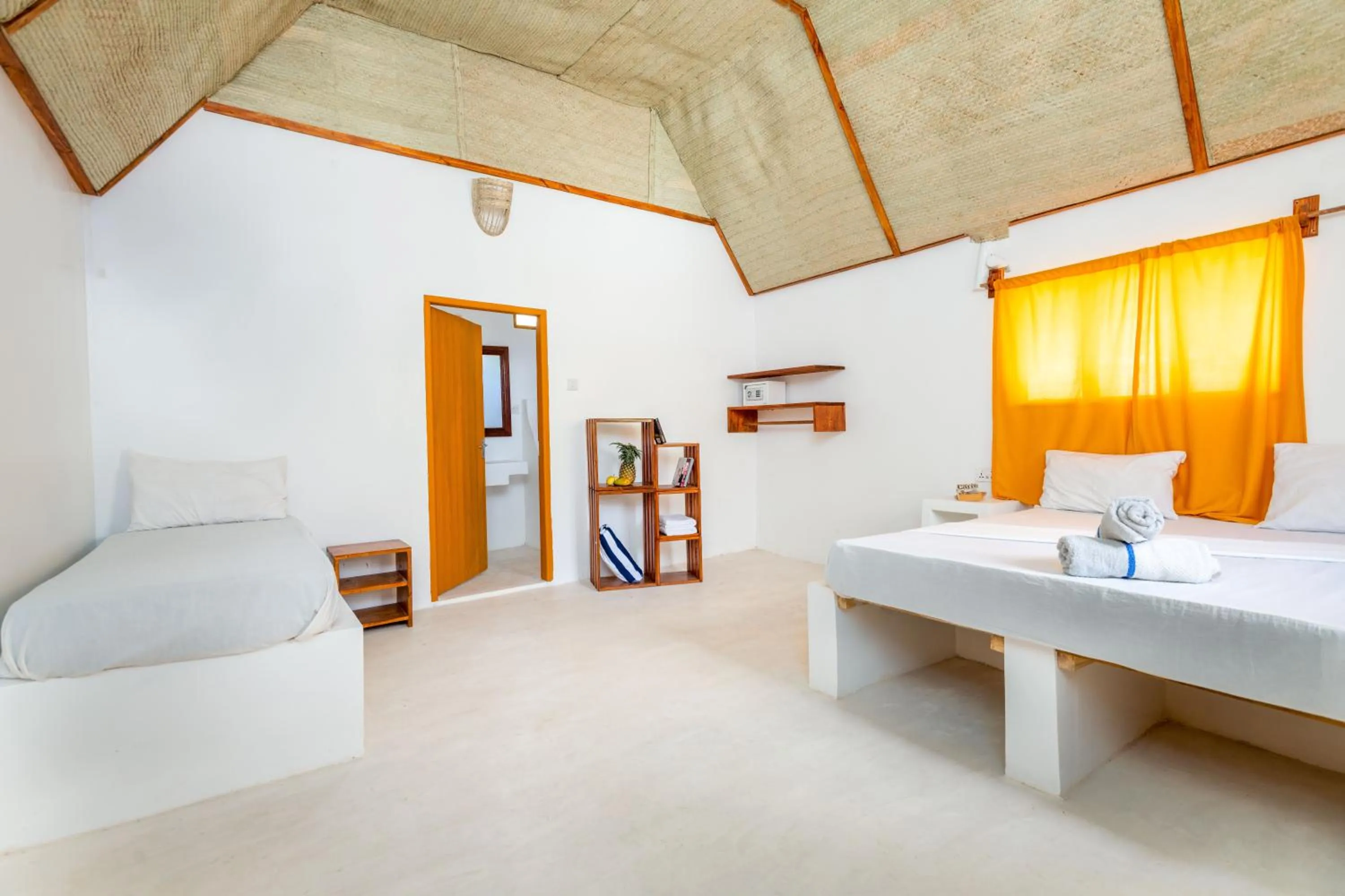 Bed in Cinnamon Hotel