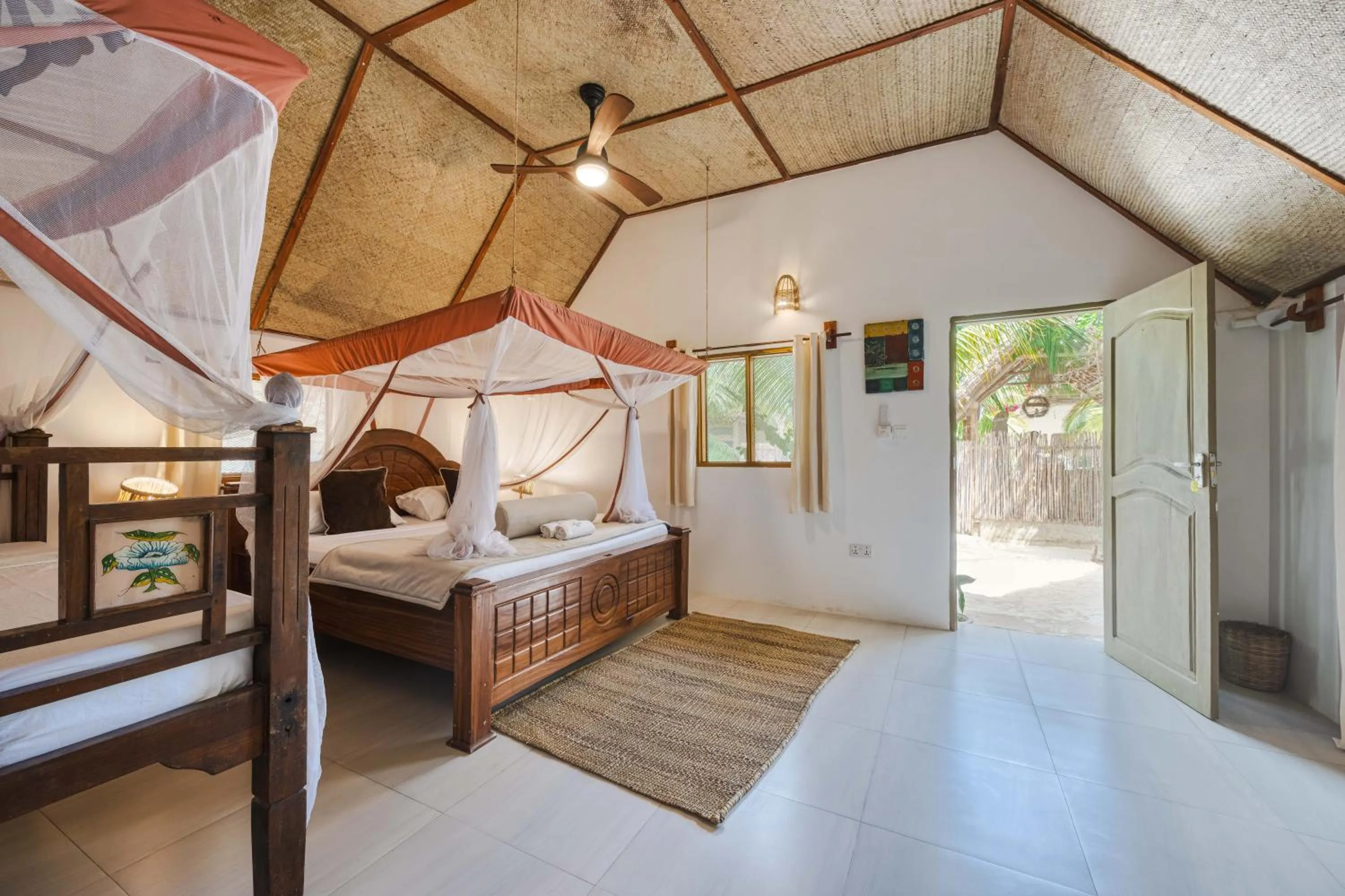 Bed in Cinnamon Hotel